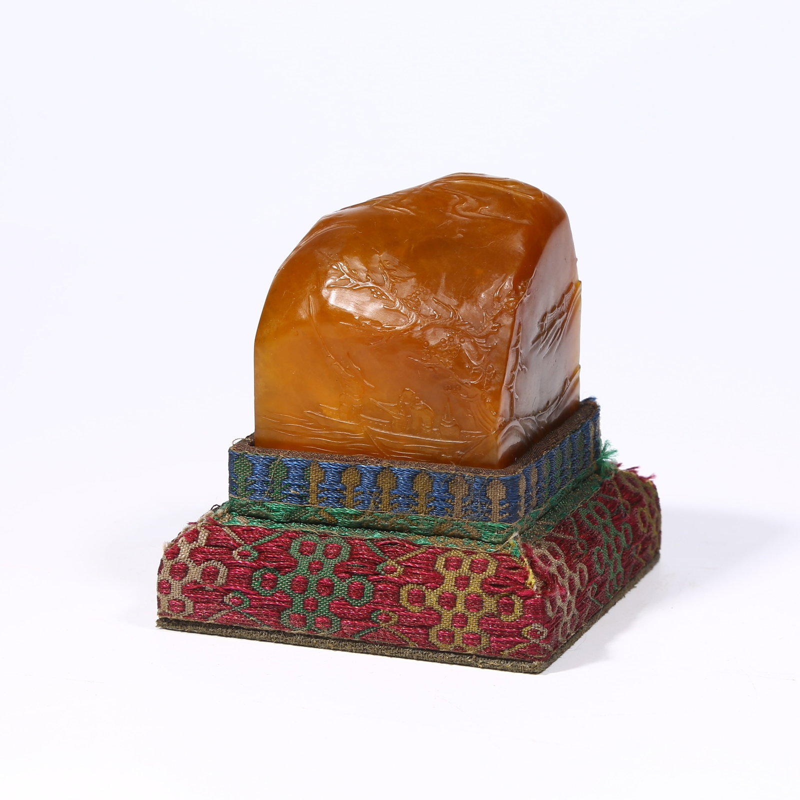 A SHOUSHAN TIANHUANG STONE SEAL WITH SHALLOW-RELIEF "FISHING FUN" DESIGN: Shoushan Tianhuang stone seal with shallow-relief "Fishing Fun" design