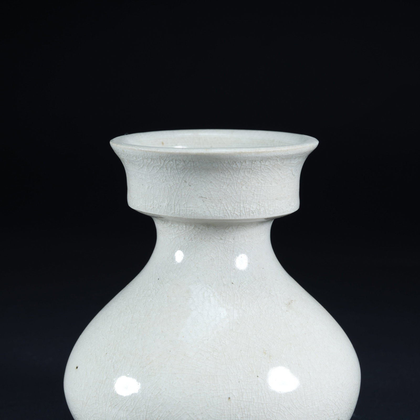 A WHITE-GLAZED SLAG CONTAINER - 2