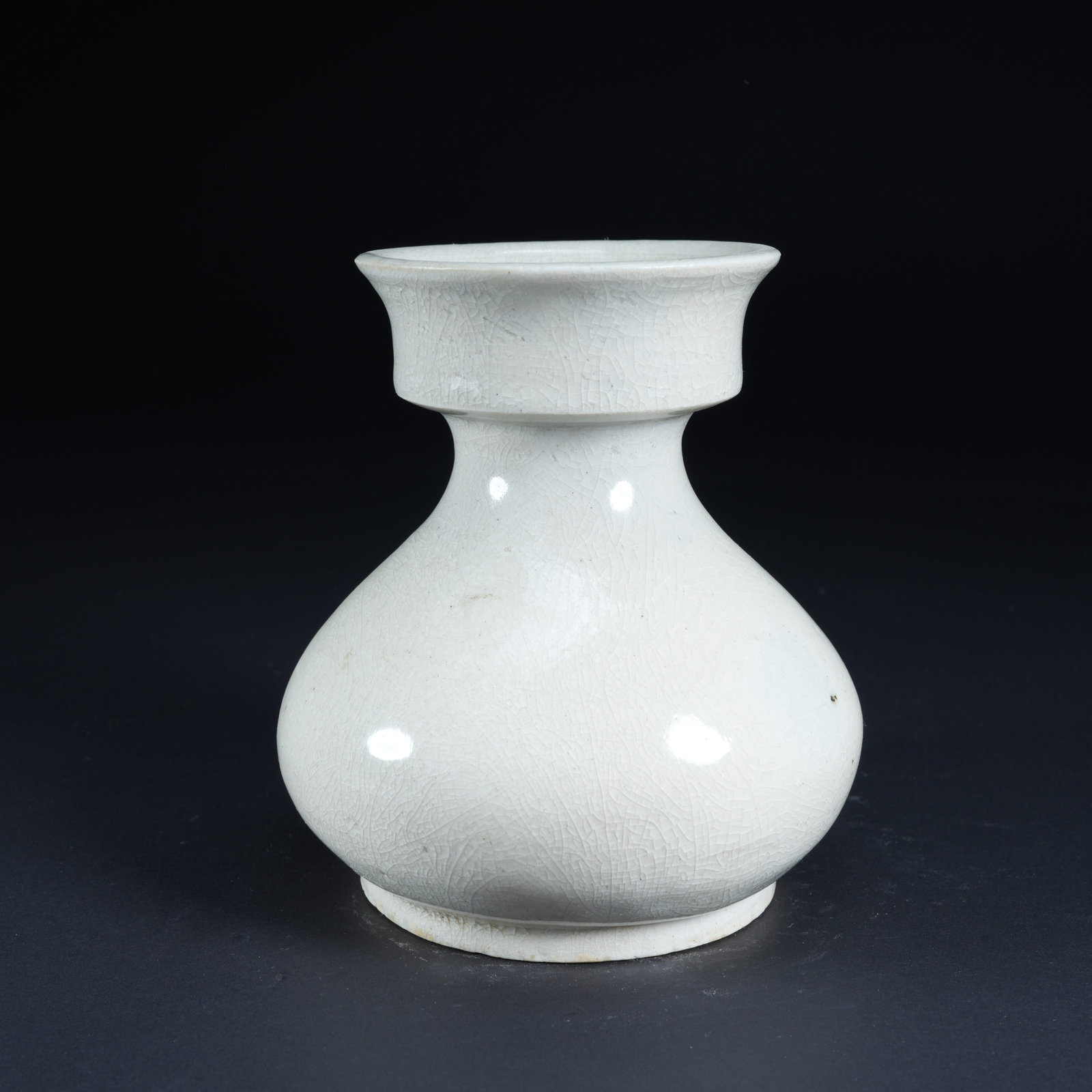 A WHITE-GLAZED SLAG CONTAINER - 7