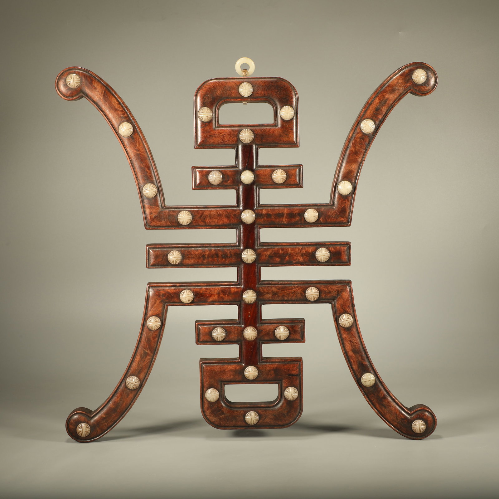 A HUANGHUALI HANGING SCREEN INLAID WITH JADE CARVED LONGEVITY CHARACTER: Huanghuali Hanging Screen Inlaid with Jade Carved Longevity Character