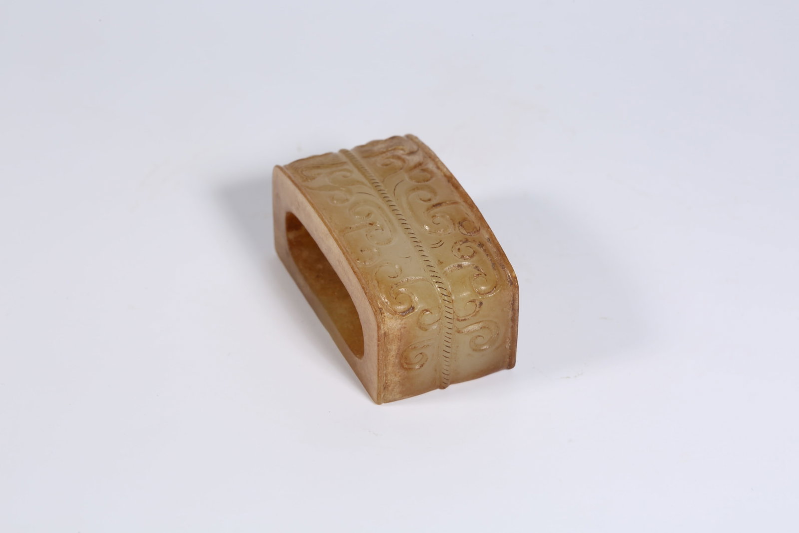 A ANCIENT JADE SWORD FITTING WITH INTERLINKED CLOUD MOTIF - 2