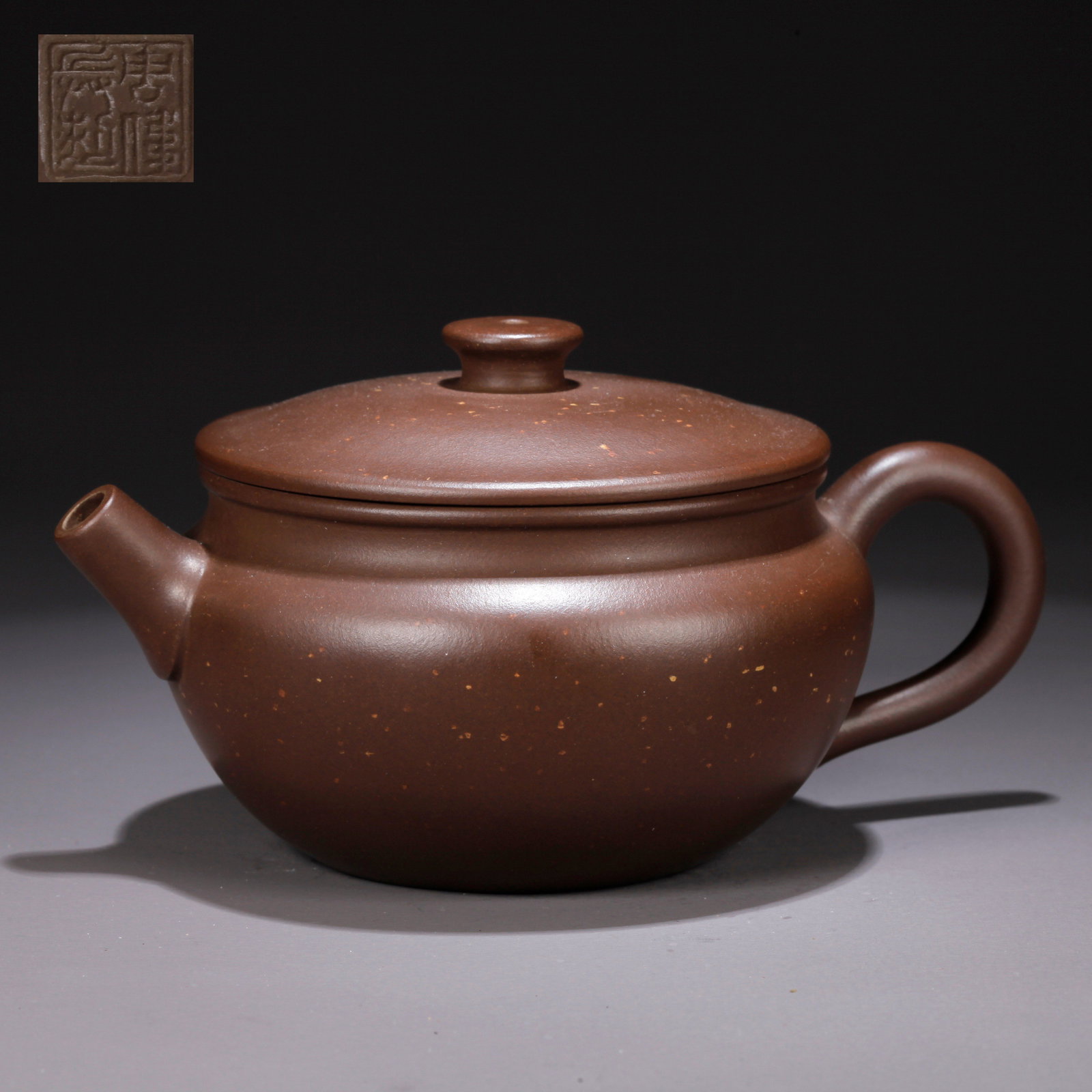 A PURPLE CLAY (ZISHA) TEAPOT (1 of 8)