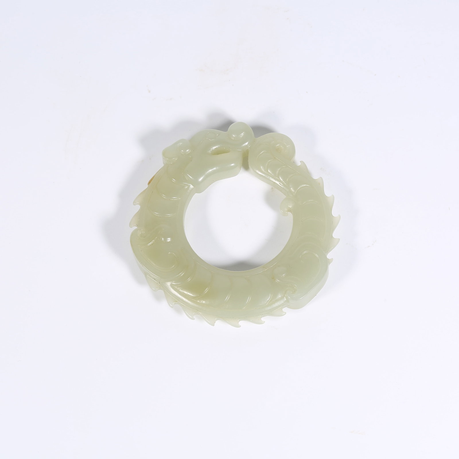 A HETIAN JADE OUROBOROS DRAGON RING: Hetian Jade Ouroboros Dragon Ring