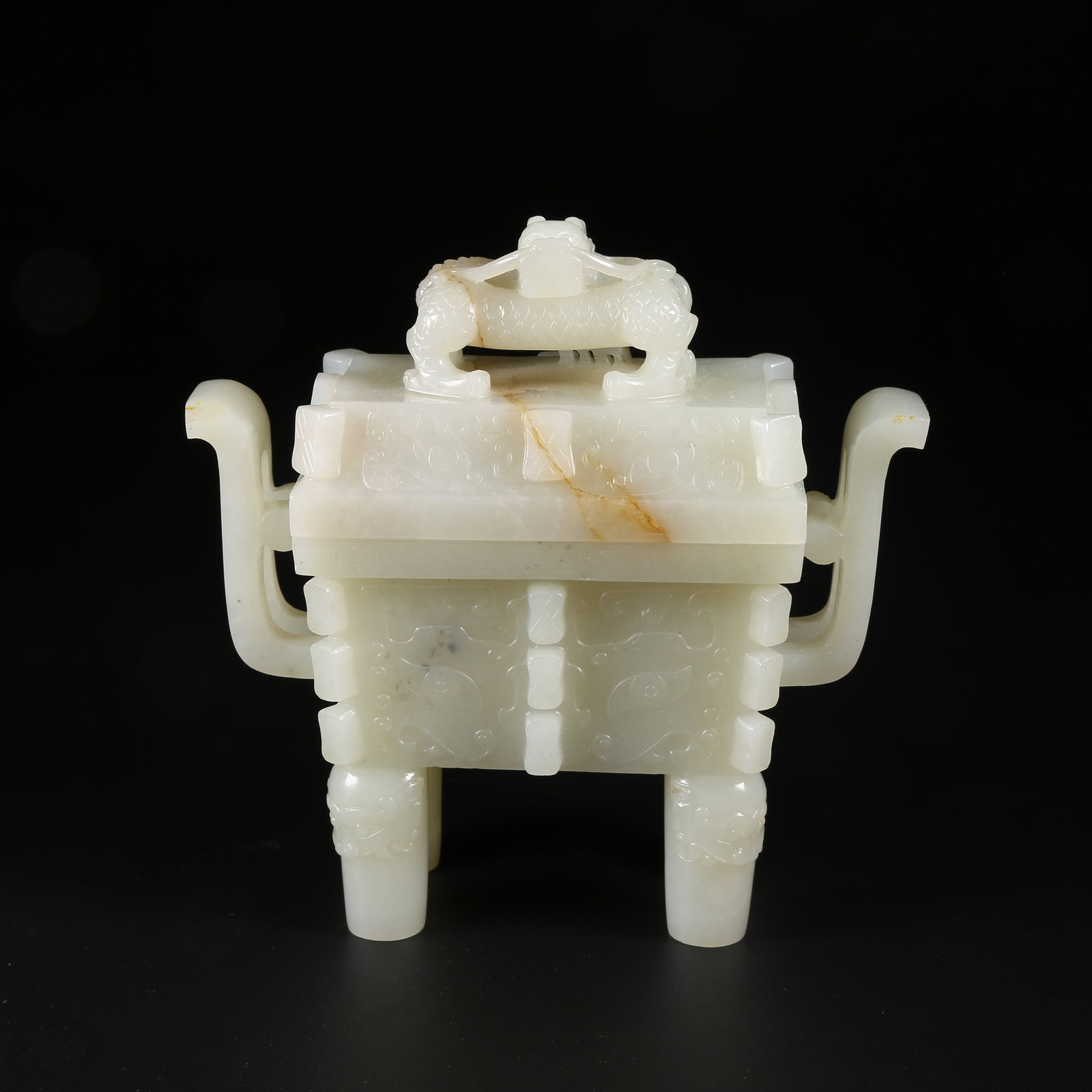 A HETIAN JADE TRIPOD CENSER WITH BEAST FACE MOTIF: Hetian Jade Tripod Censer with Beast Face Motif