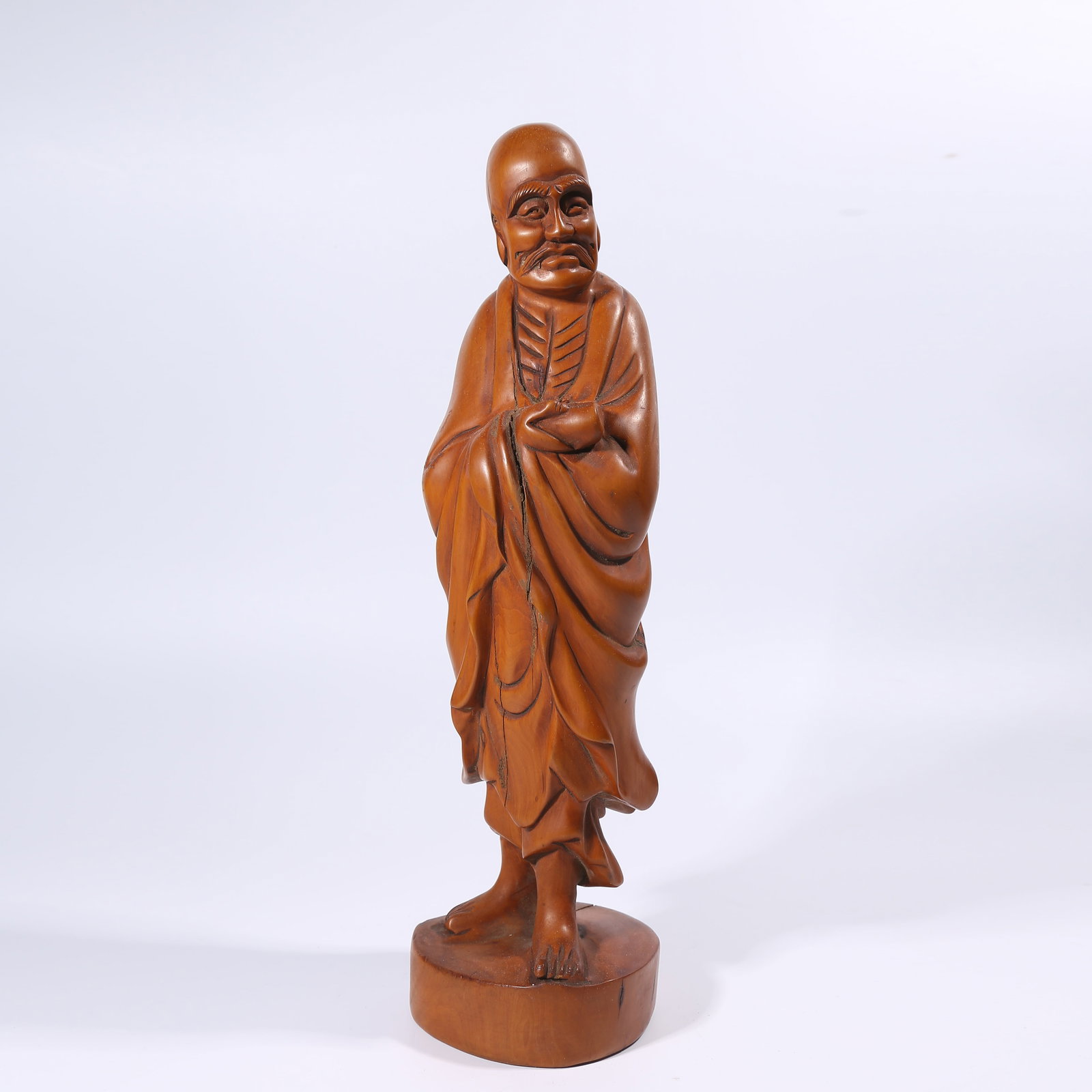 A HUANGHUALI WOOD DARUMA FIGURINE: Huanghuali Wood Daruma Figurine
