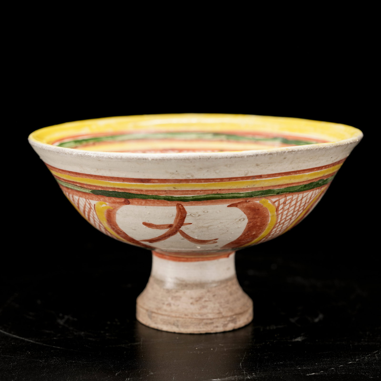 A TANG SANCAI TALL FOOTED BOWL WITH "GREAT LUCK AND PROSPERITY" MOTIF (1 of 9)