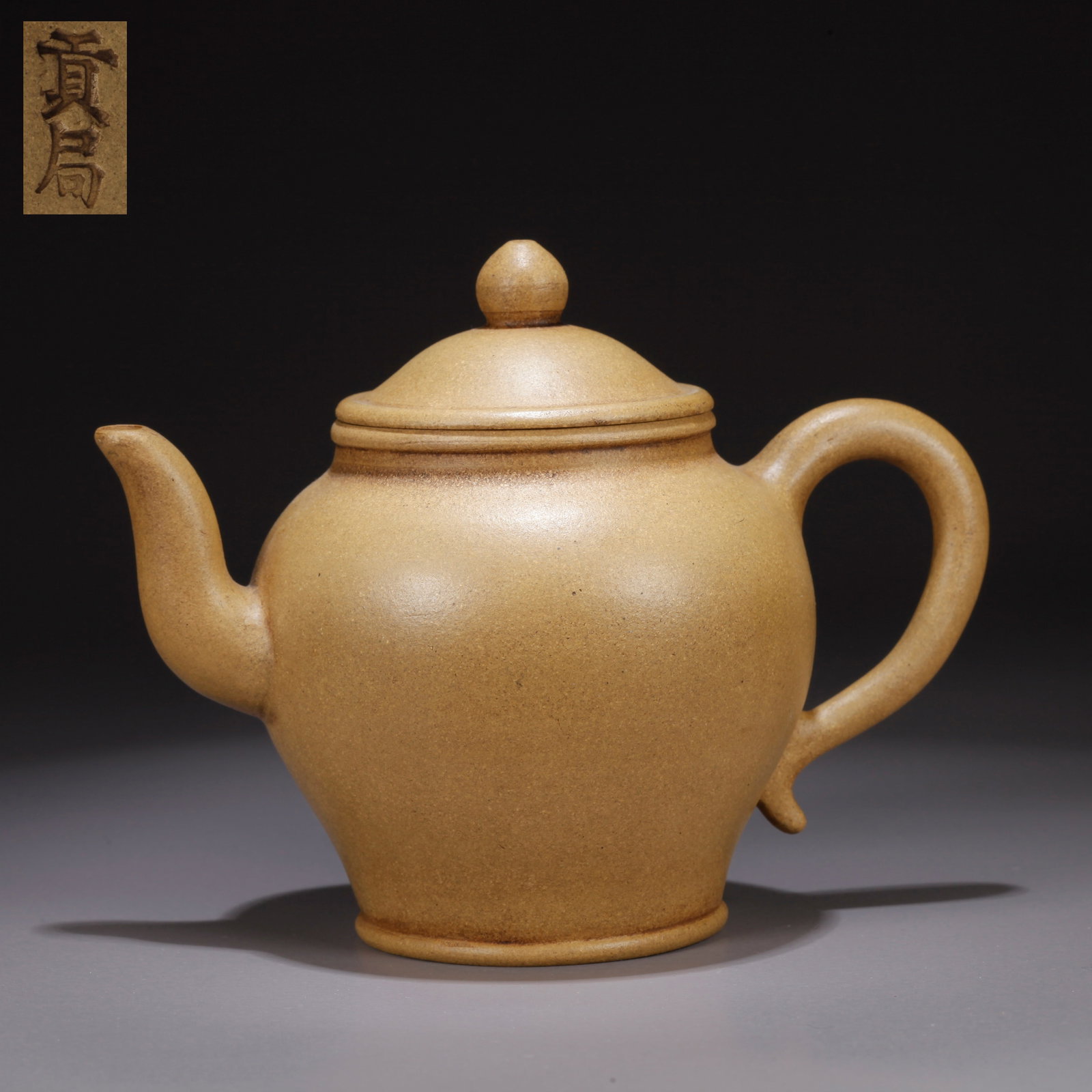 A PURPLE CLAY (ZISHA) TEAPOT: Purple Clay (Zisha) Teapot