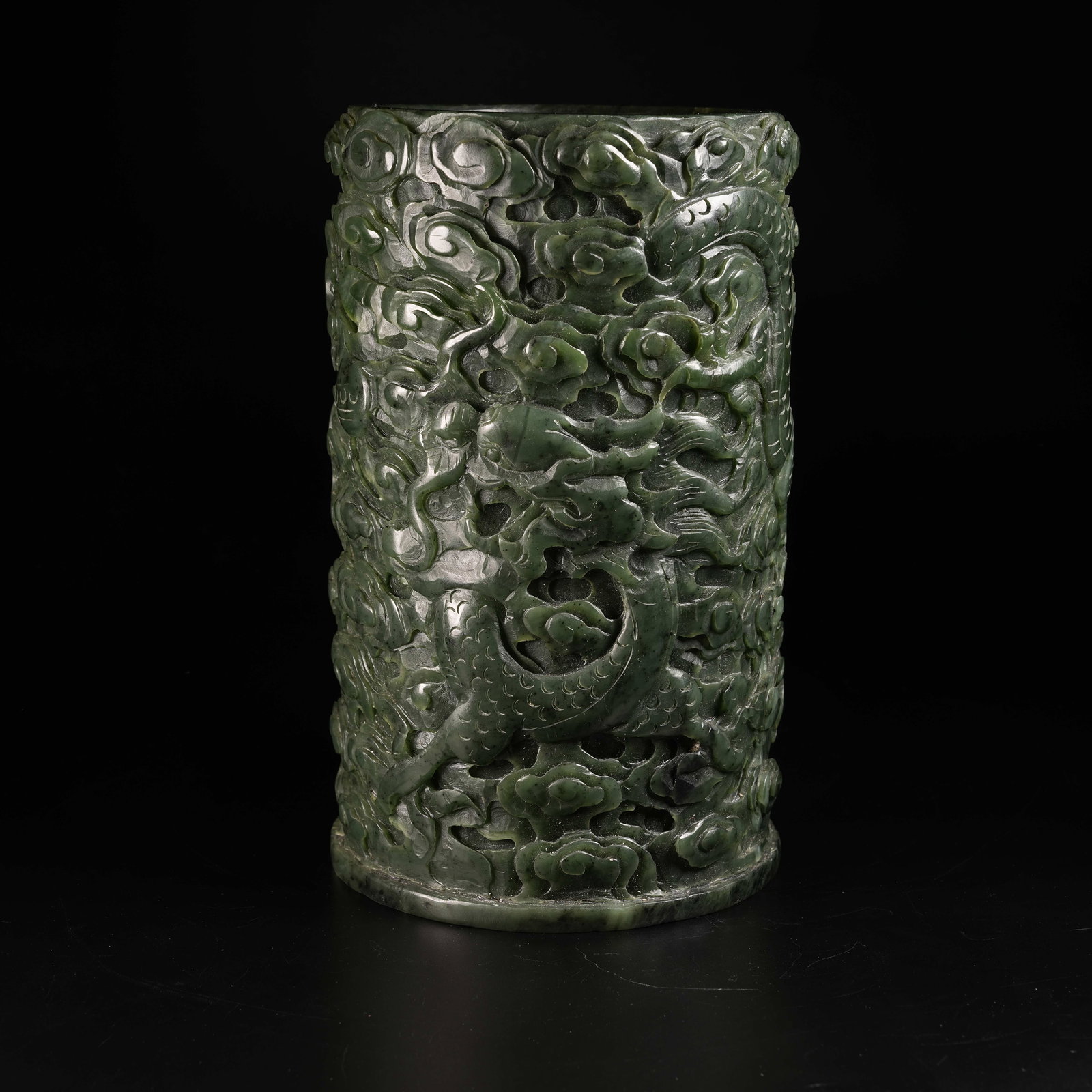 A HETIAN JASPER BRUSH POT WITH CLOUD-AND-DRAGON MOTIF (1 of 9)