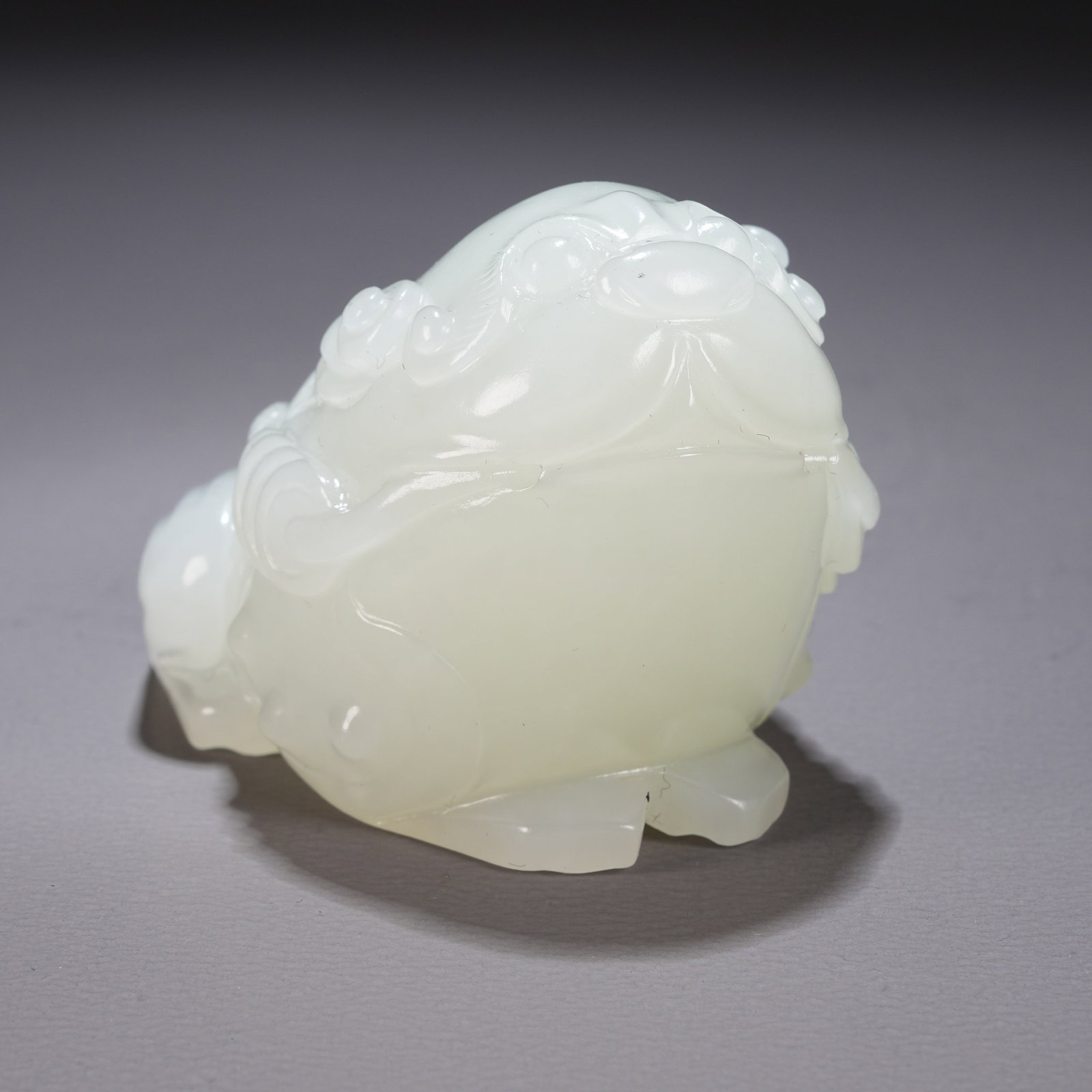 A HETIAN WHITE JADE AUSPICIOUS BEAST ORNAMENT (1 of 8)