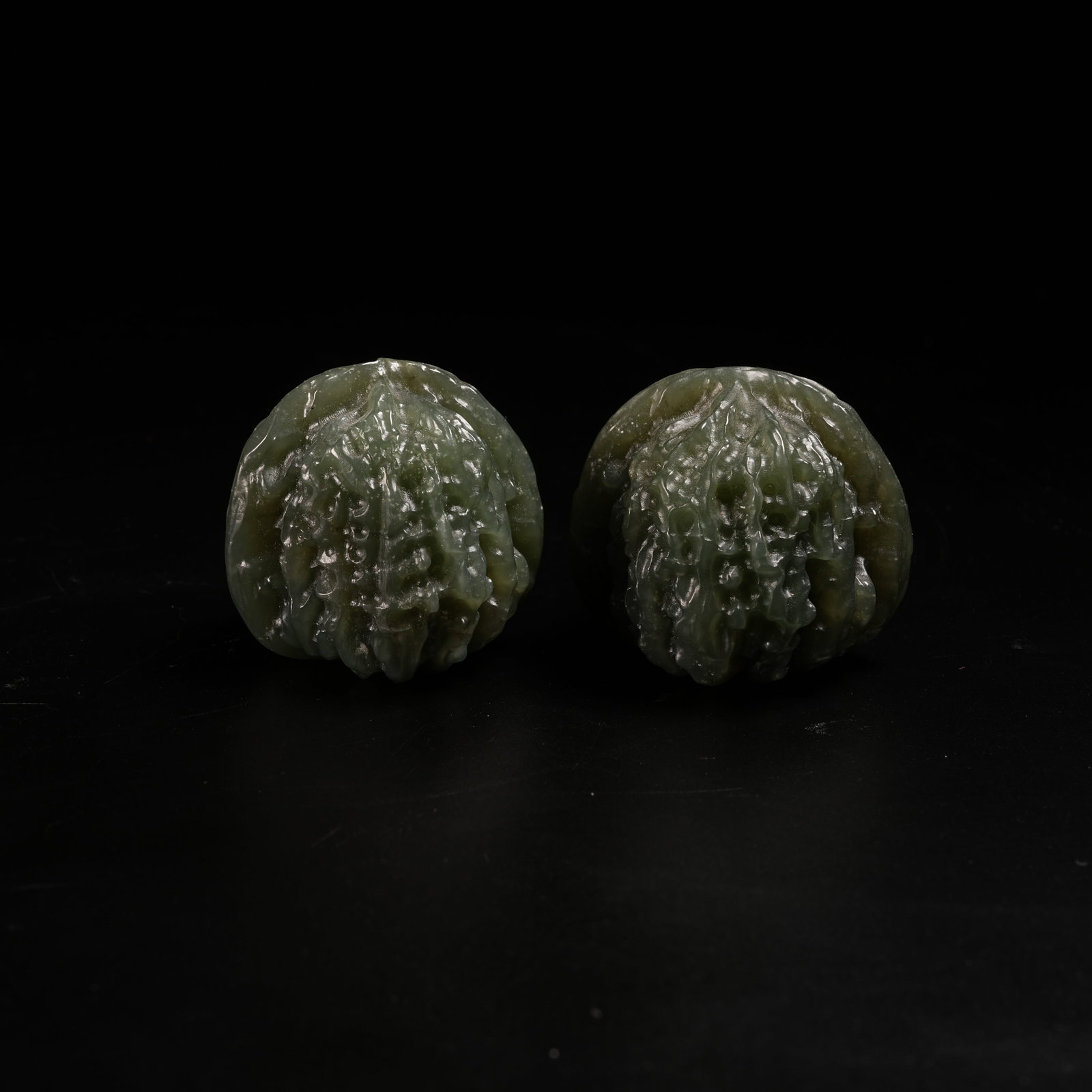 A SET OF HETIAN JASPER WALNUTS (1 of 9)