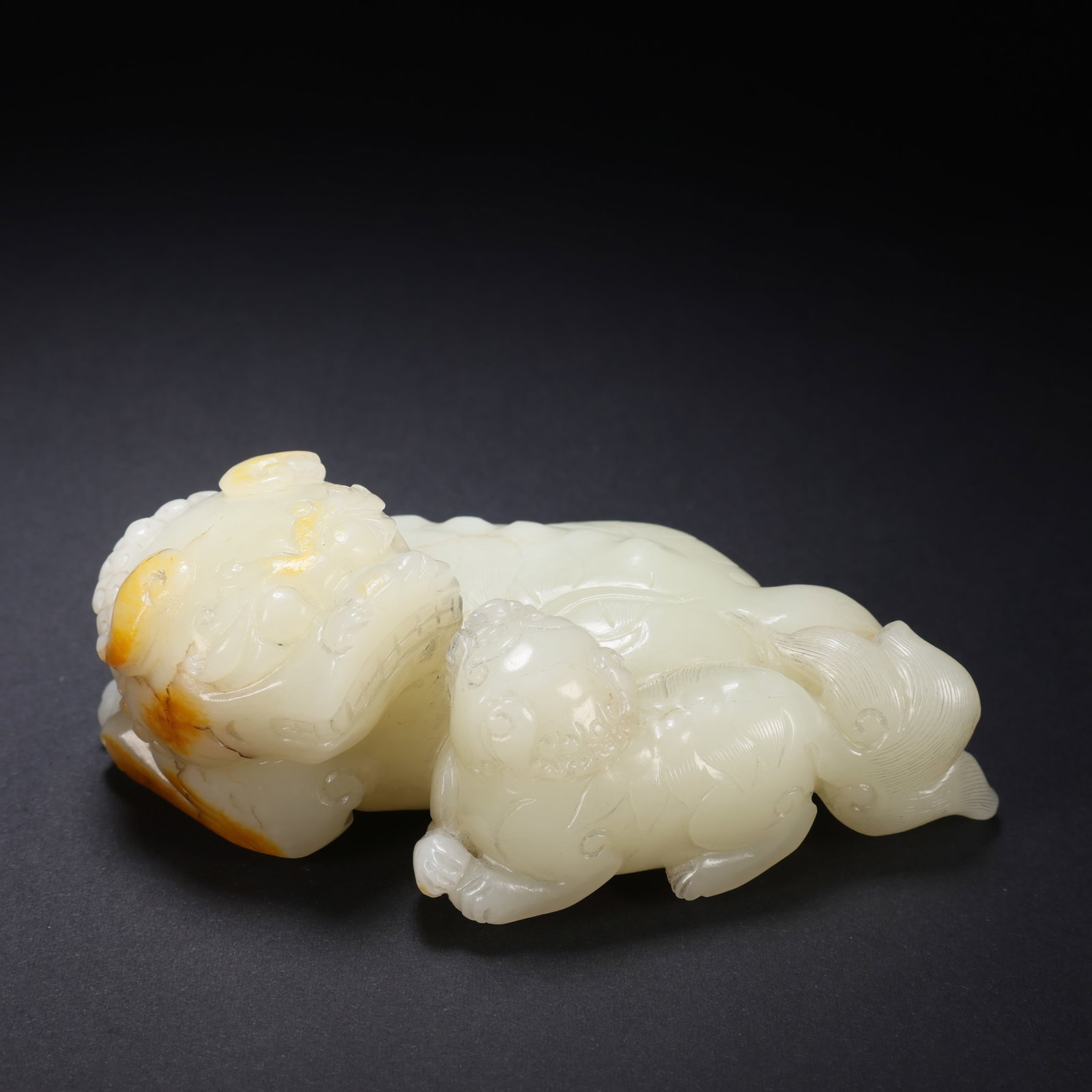 A HETIAN JADE CONTRASTING COLOR MOTHER-AND-CHILD BEAST (1 of 9)