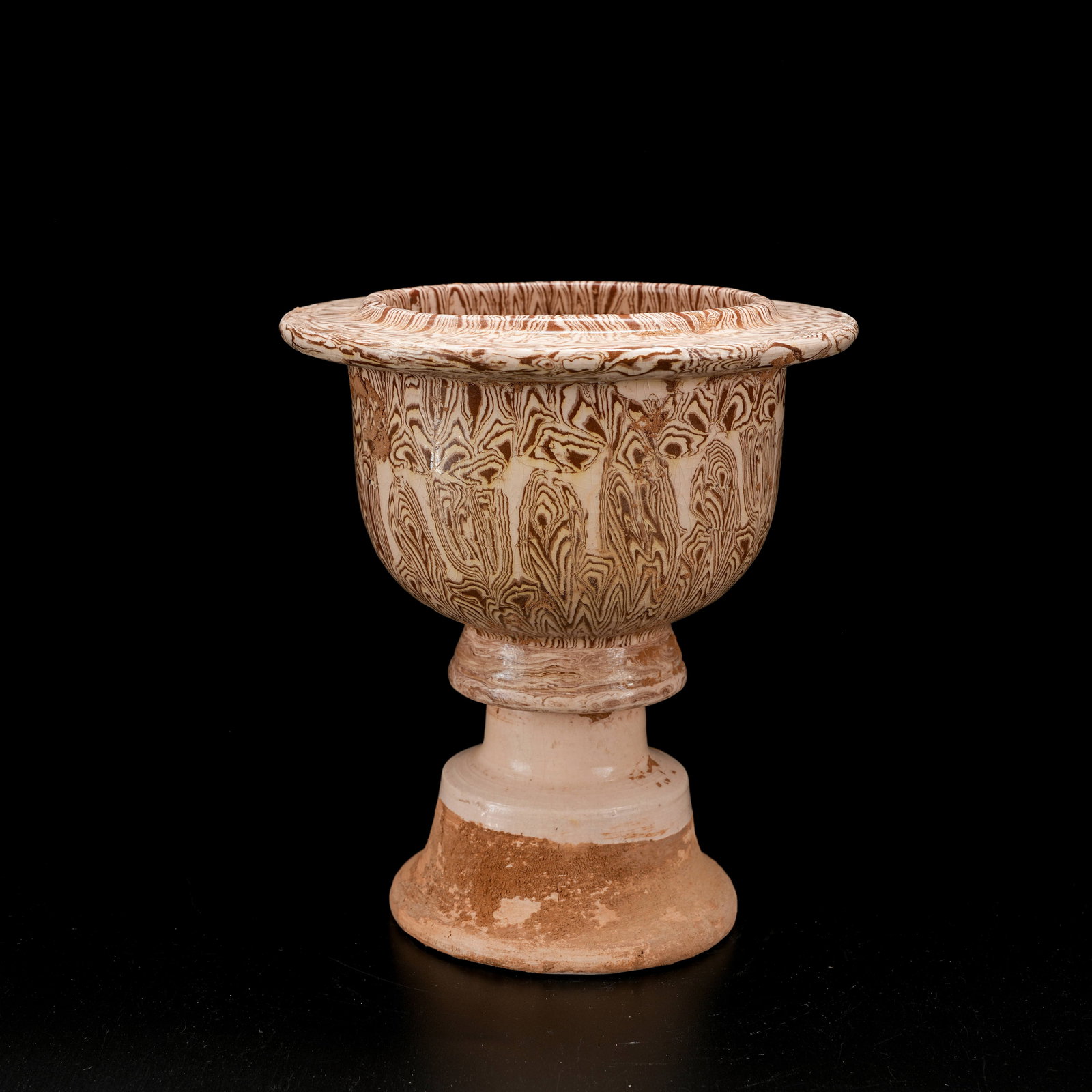A COILED CLAY FOLDED-RIM CANDLESTICK: Coiled Clay Folded-Rim Candlestick