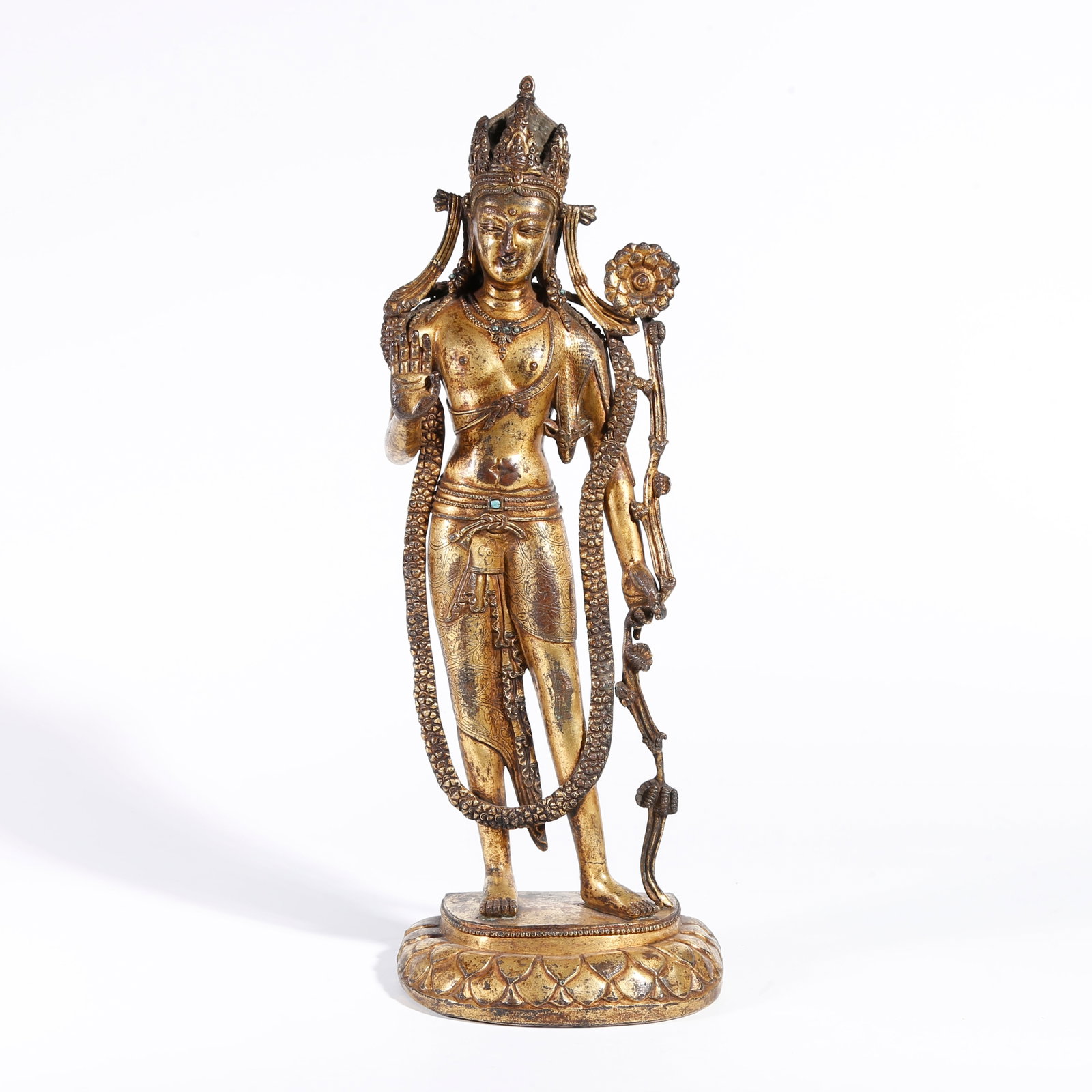 A GILT BRONZE STATUE OF PADMA HASTAVARA: Gilt Bronze Statue of Padma Hastavara
