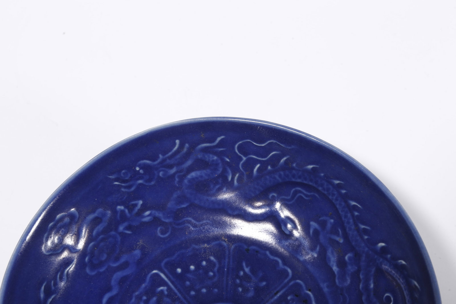 A BLUE GLAZED PLATE WITH CLOUD AND DRAGON PATTERN - 2