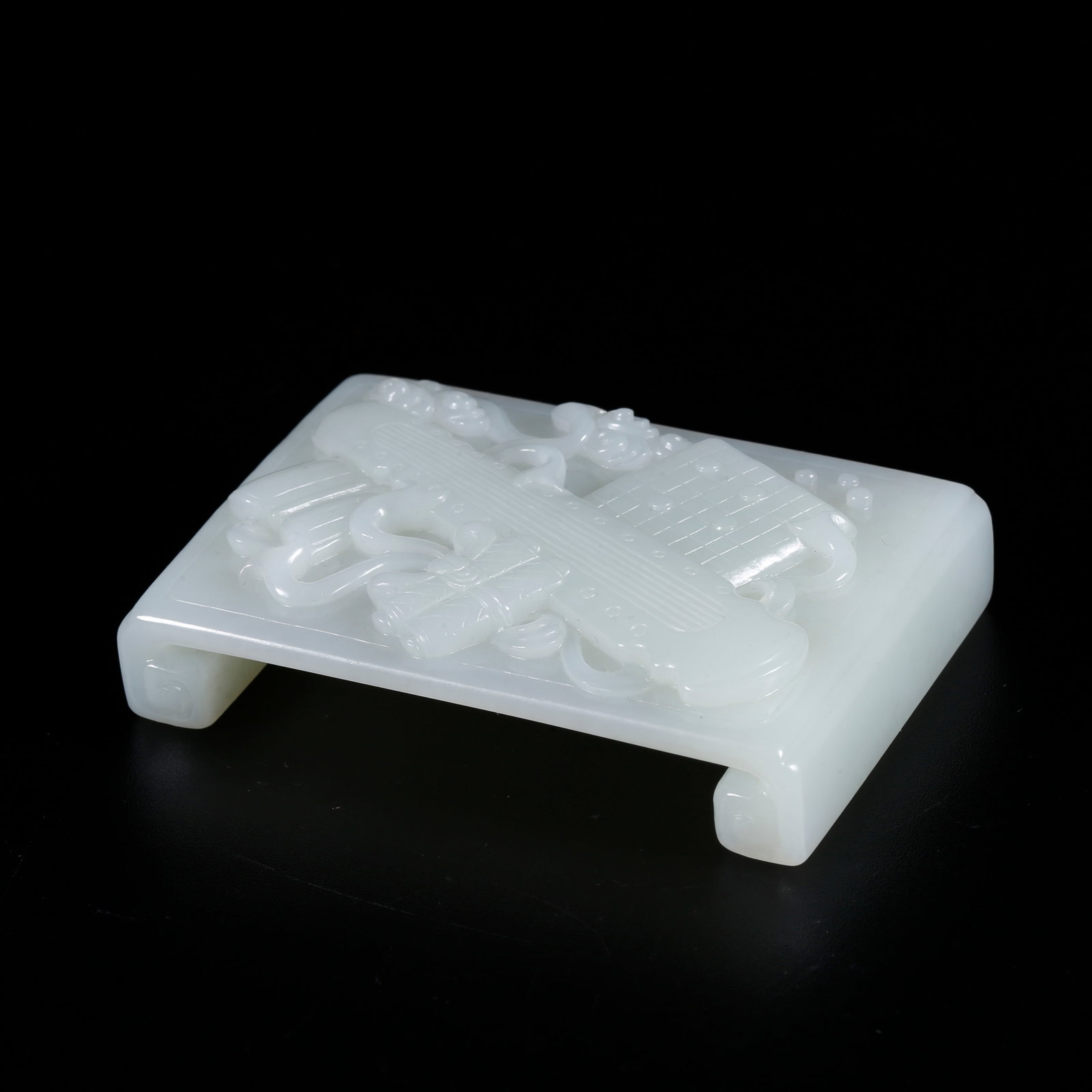 A HOTAN JADE CARVED INK REST WITH QIN, CHESS, CALLIGRAPHY AND PAINTING PATTERN (1 of 8)