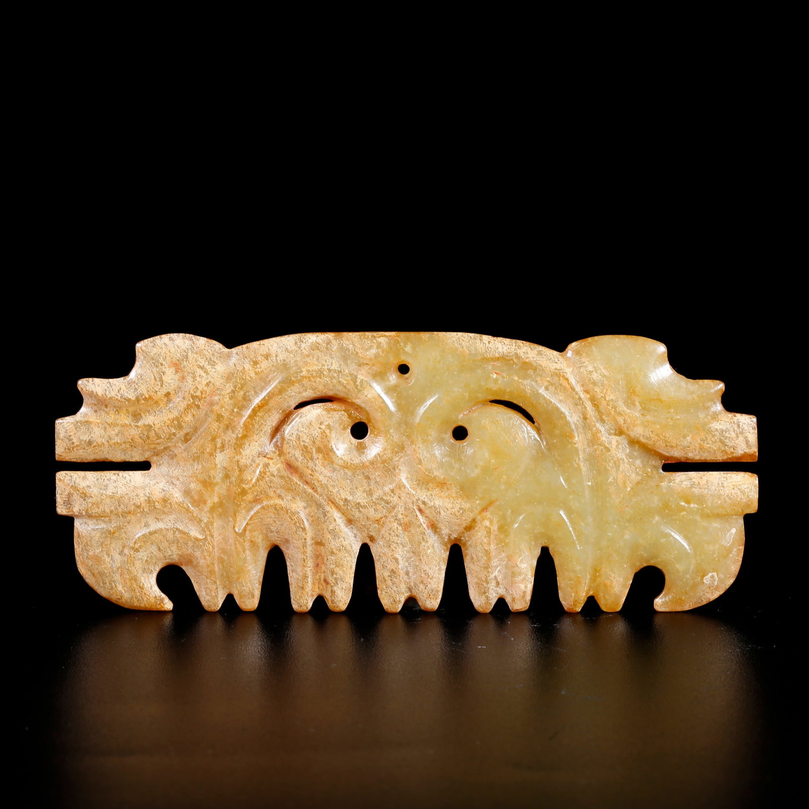 A ARCHAIC JADE CARVING OF A CLOUD-SCROLL PENDANT (1 of 8)