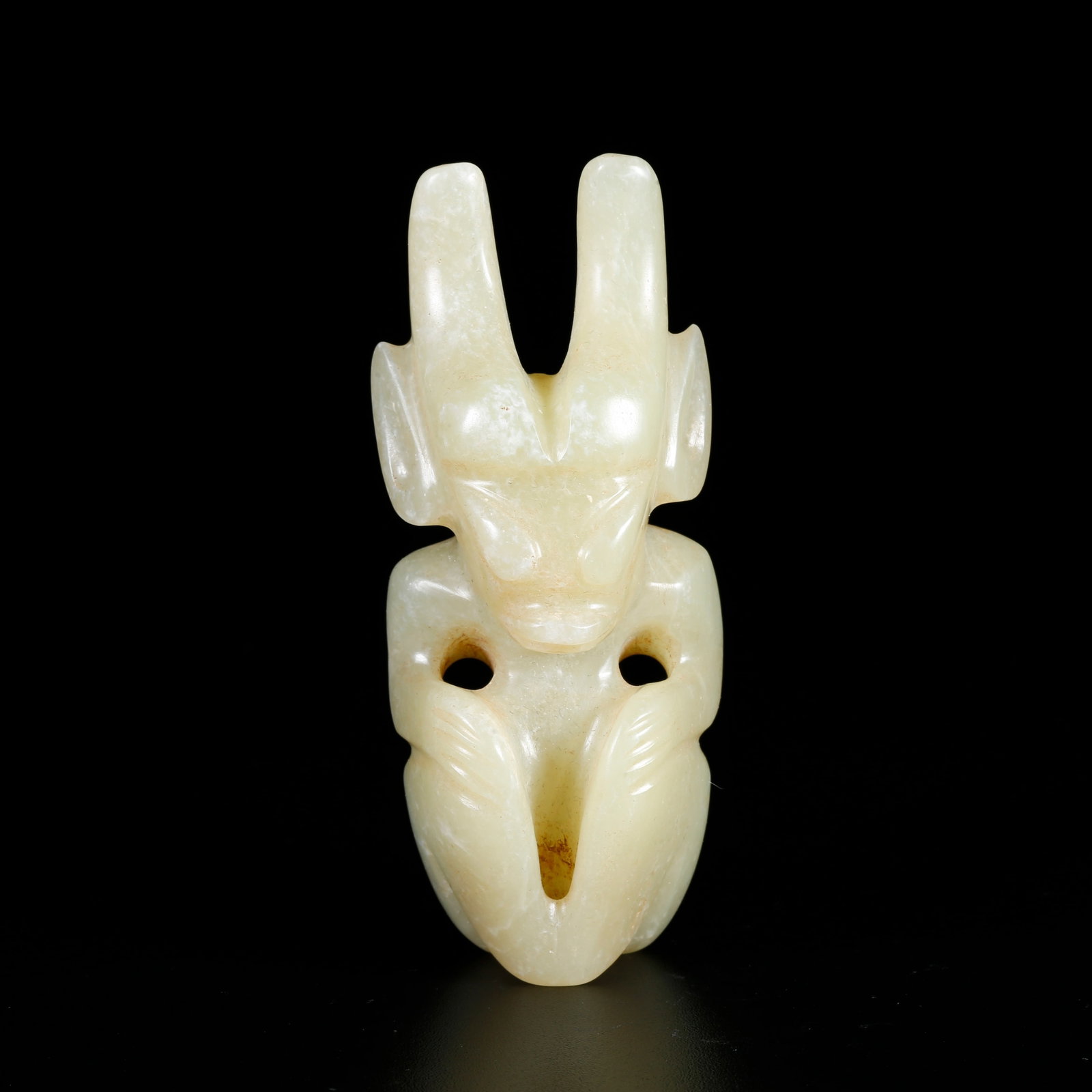 A HETIAN JADE CARVING OF A SUN DEITY ORNAMENT (1 of 10)