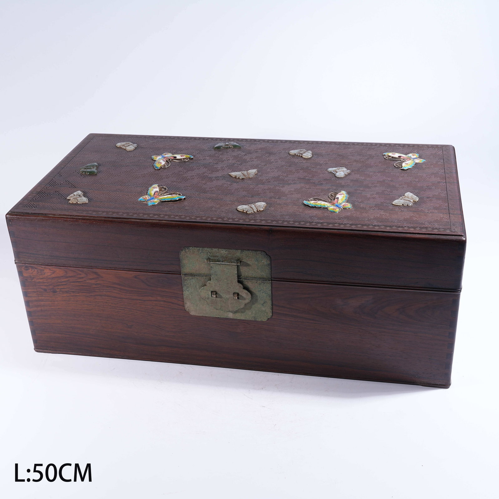 A CHEST IN HUANGHUALI WOOD INLAID WITH JADE AND CLOISONNÉ, DECORATED WITH "HUNDRED BUTTERFLIES": Chest in Huanghuali Wood Inlaid with Jade and Cloisonné, Decorated with "Hundred Butterflies" Motif