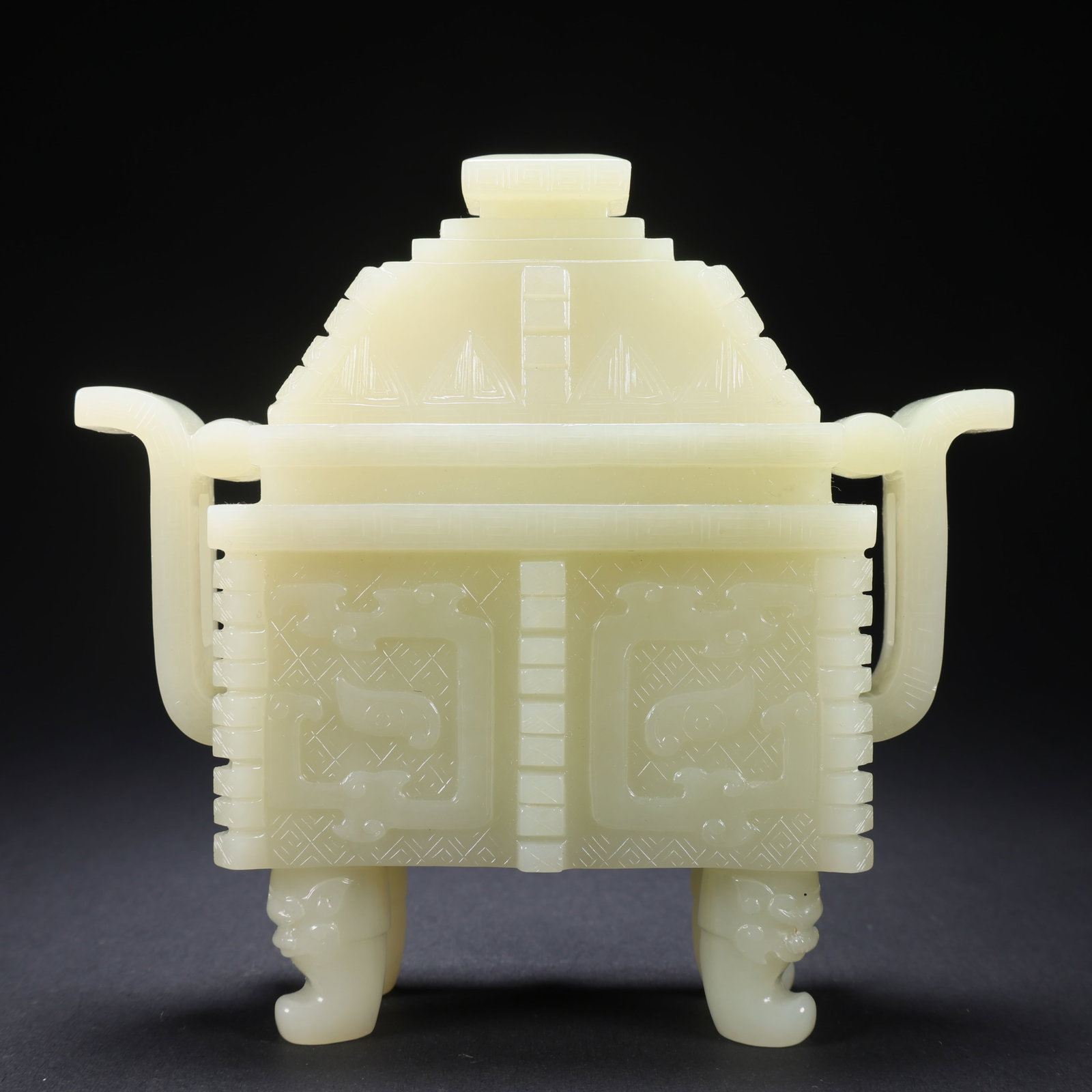 A HETIAN JADE FOUR-LEGGED DING (TRIPOD VESSEL): Hetian Jade Four-Legged Ding (Tripod Vessel)