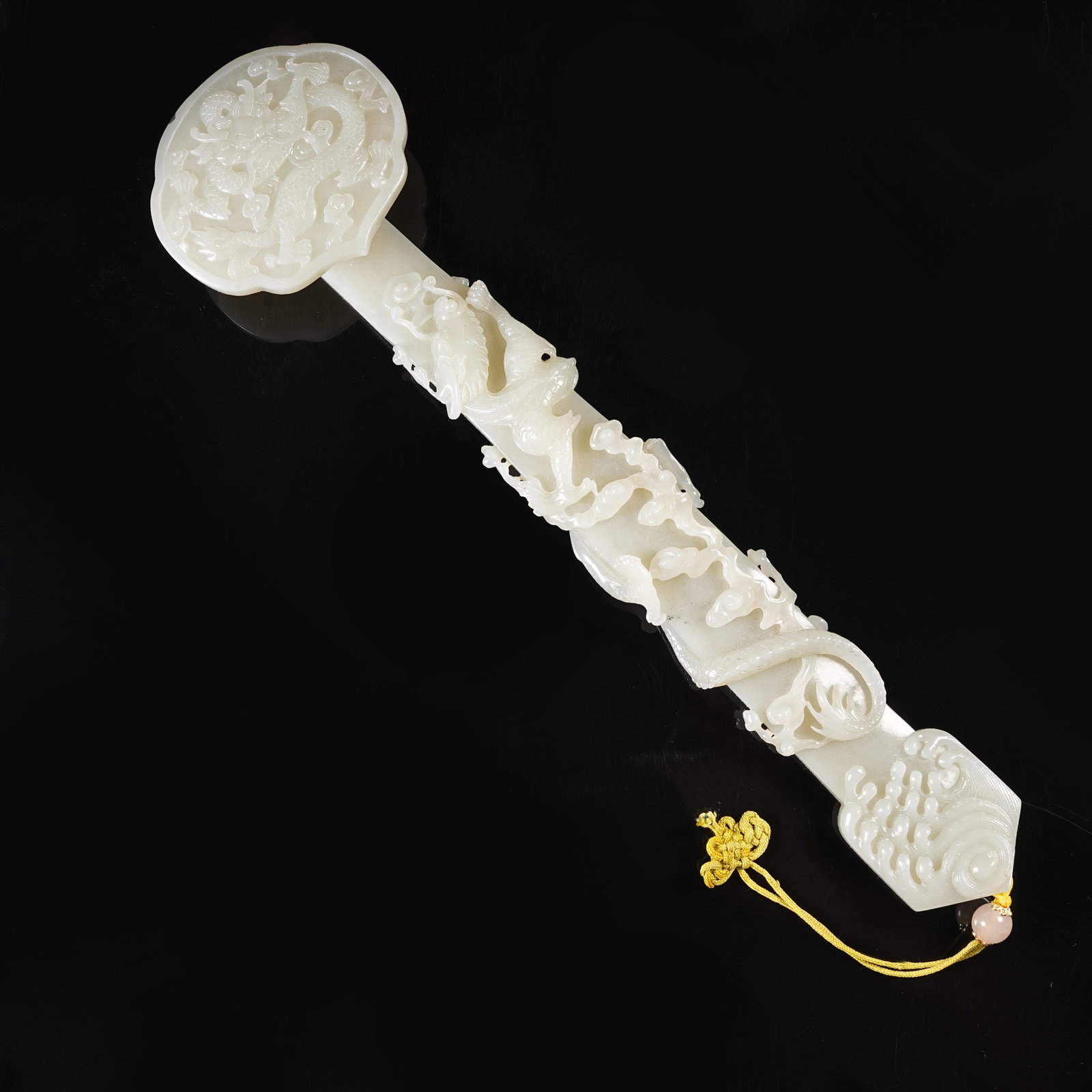 A HETIAN WHITE JADE RUYI SCEPTER WITH CLOUD-AND-DRAGON MOTIF (1 of 7)
