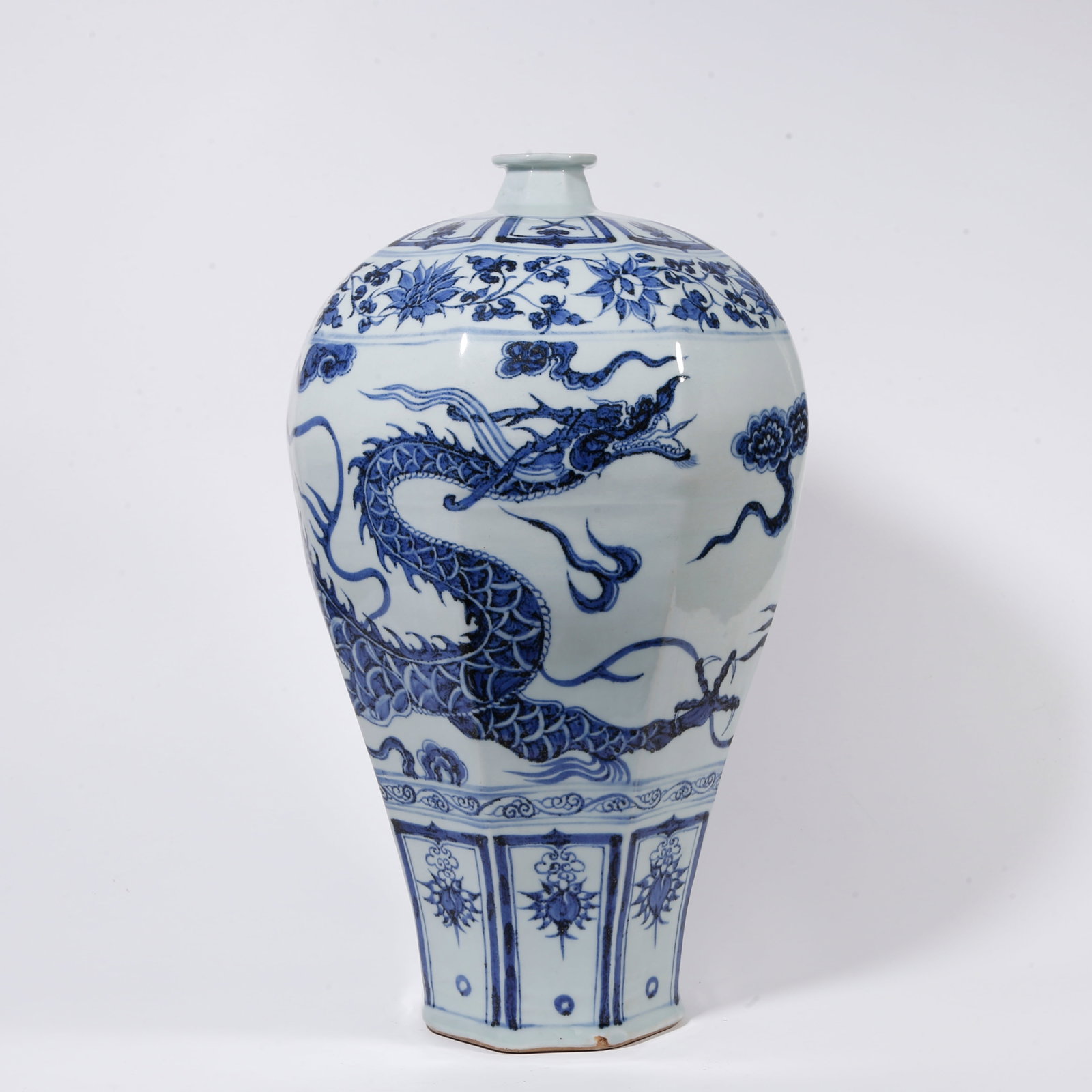A BLUE AND WHITE PLUM VASE WITH CLOUD AND DRAGON PATTERN: Blue and White Plum Vase with Cloud and Dragon Pattern