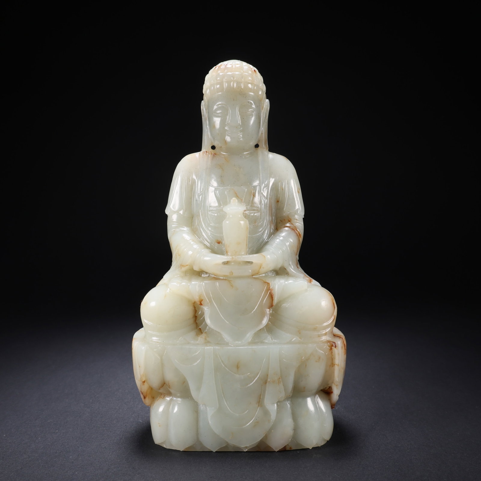 A HETIAN JADE SEATED GUANYIN (1 of 9)