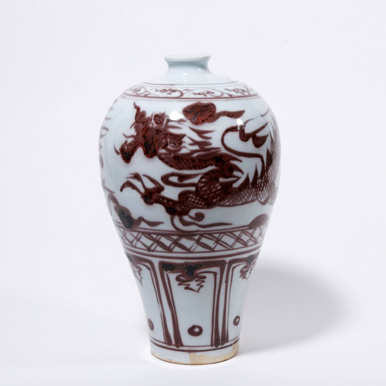 A UNDERGLAZE RED PLUM VASE WITH CLOUD AND DRAGON PATTERN: Underglaze Red Plum Vase with Cloud and Dragon Pattern