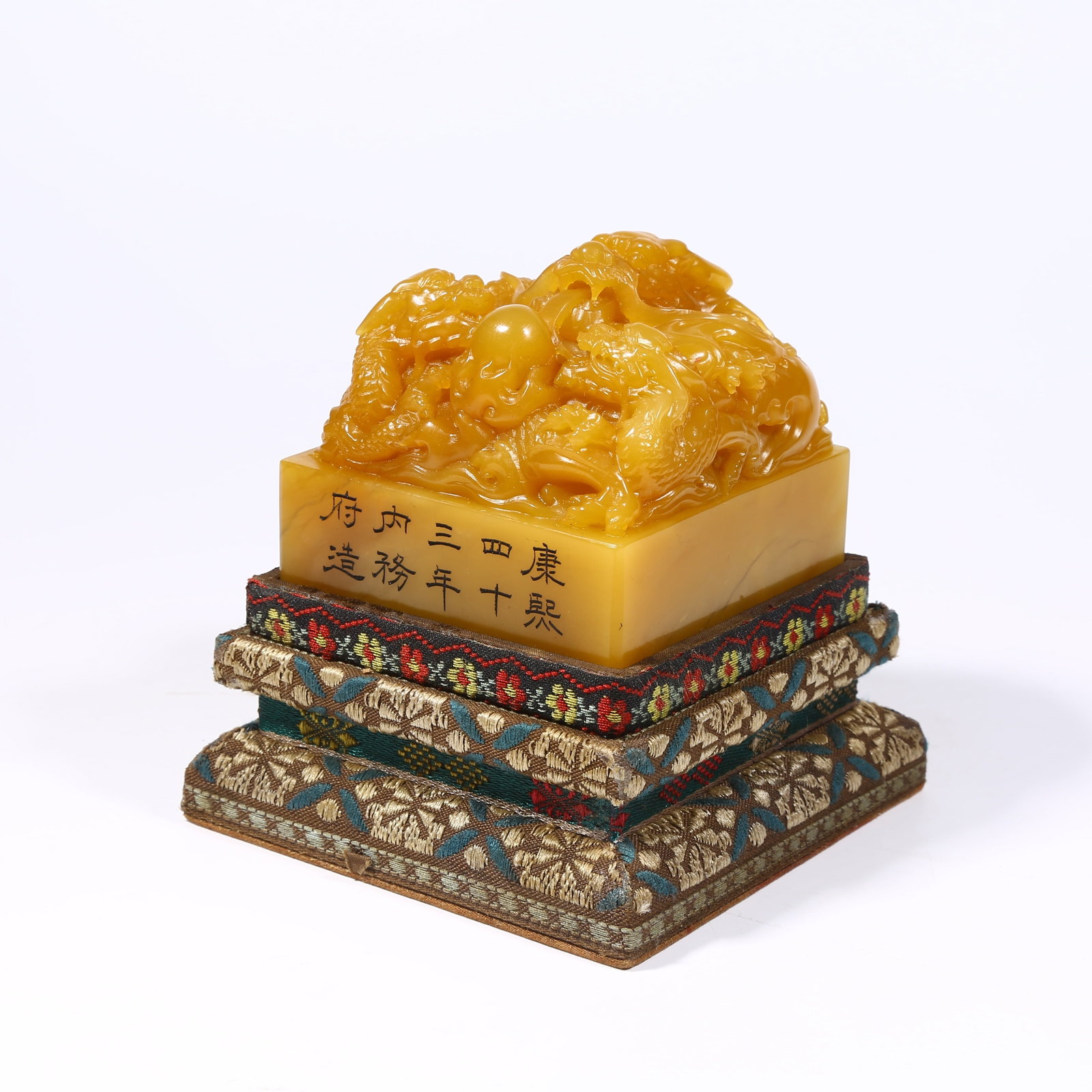 A SHOUSHAN TIANHUANG STONE SEAL WITH DRAGON KNOB: Shoushan Tianhuang stone seal with dragon knob