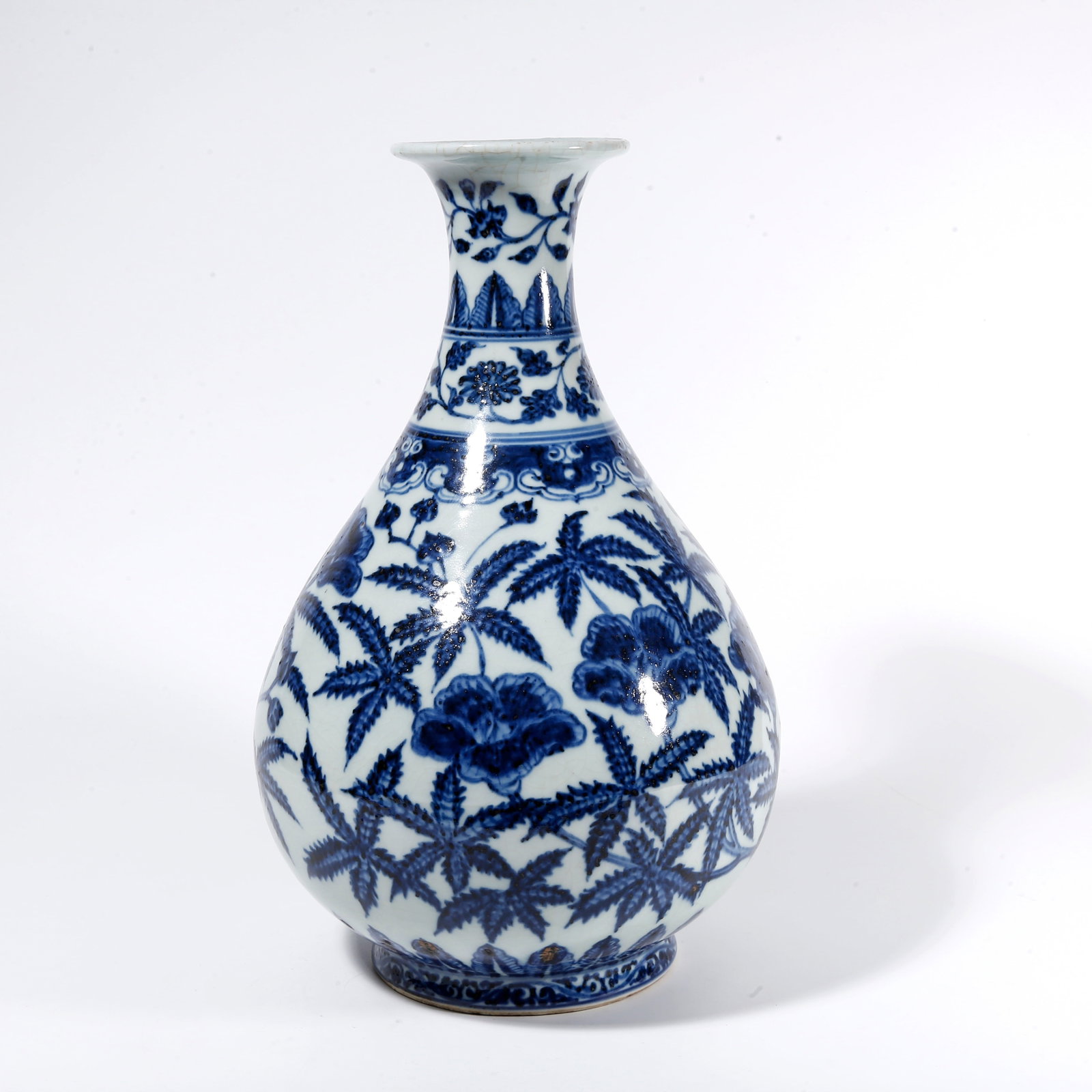 A BLUE AND WHITE PEAR-SHAPED VASE WITH FLORAL PATTERN (1 of 9)