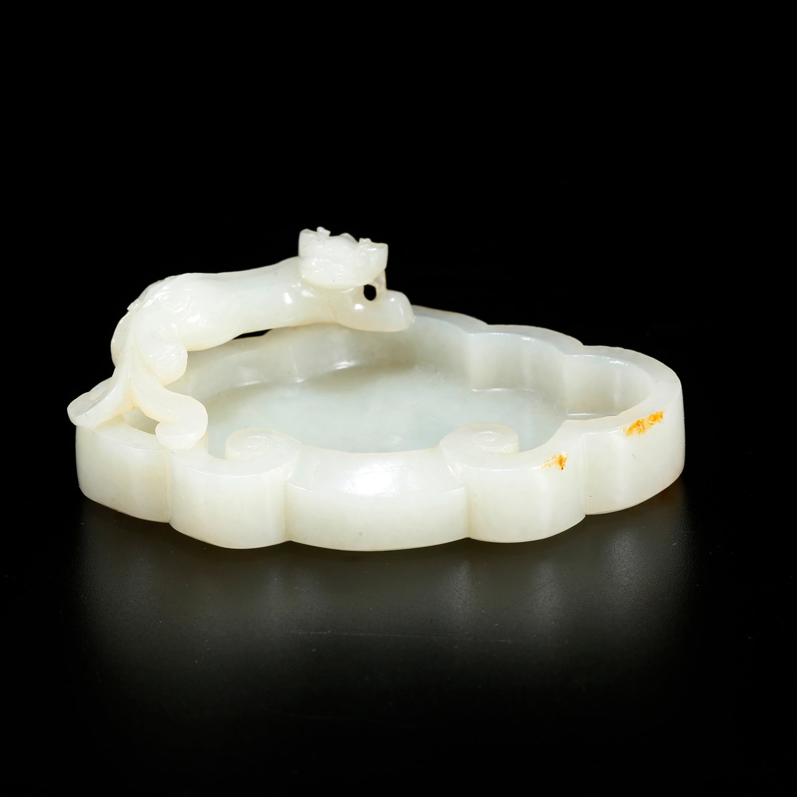 A HETIAN JADE WASHER CARVED WITH BEAST PATTERN (1 of 9)