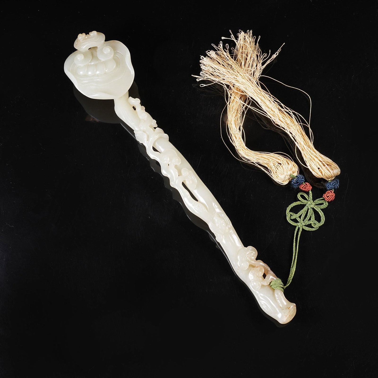 A HETIAN JADE RUYI SCEPTER IN THE FORM OF LINGZHI (1 of 7)