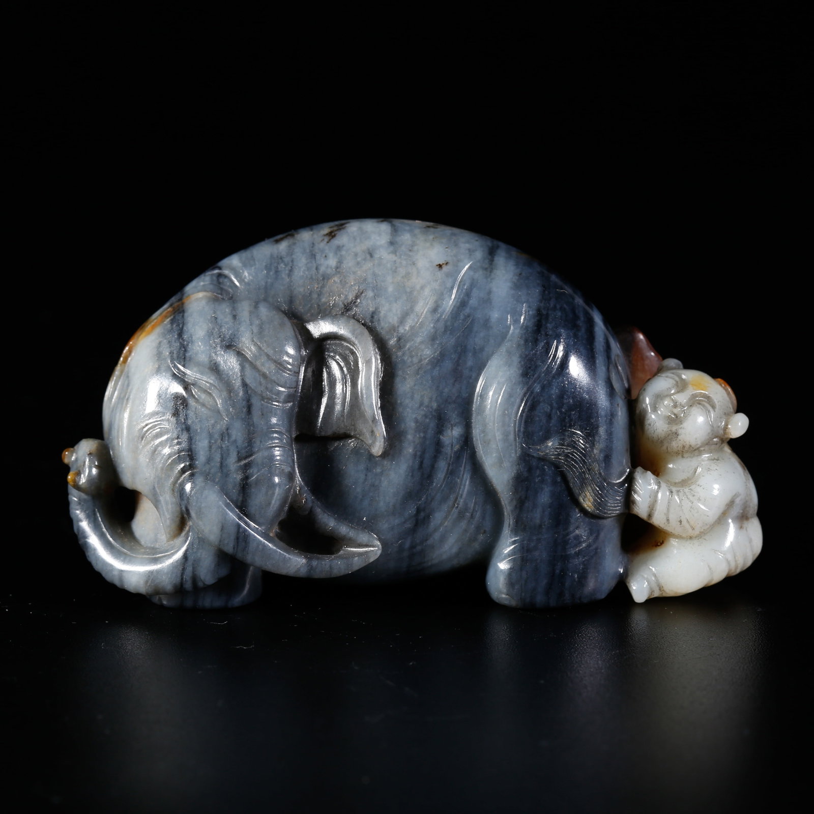 A HETIAN JADE CARVING OF "PEACE AND AUSPICIOUS ELEPHANT" FIGURINE (1 of 9)