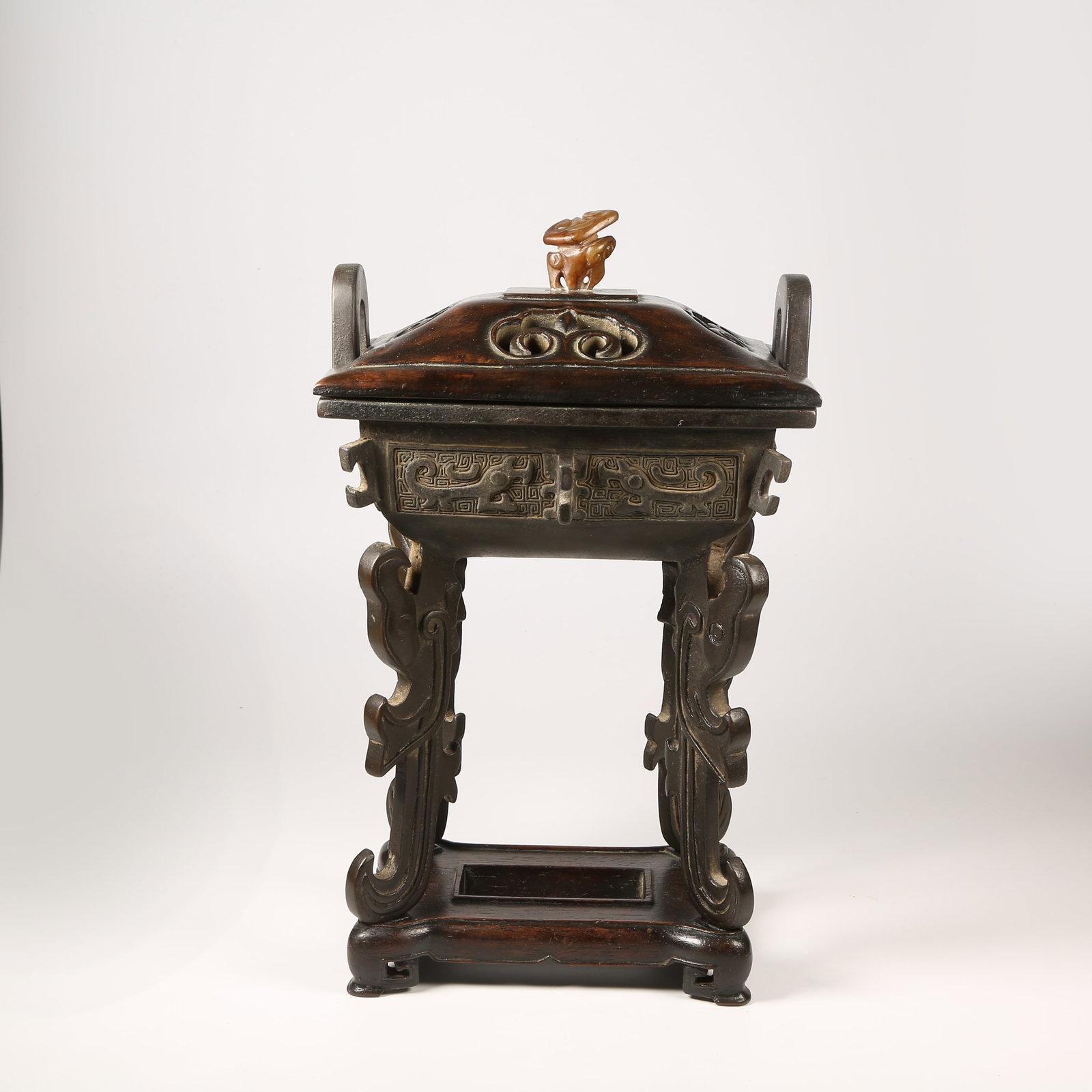 A BRONZE DING-SHAPED CENSER WITH PHOENIX MOTIFS AND UPRIGHT FINIALS: Bronze Ding-Shaped Censer with Phoenix Motifs and Upright Finials