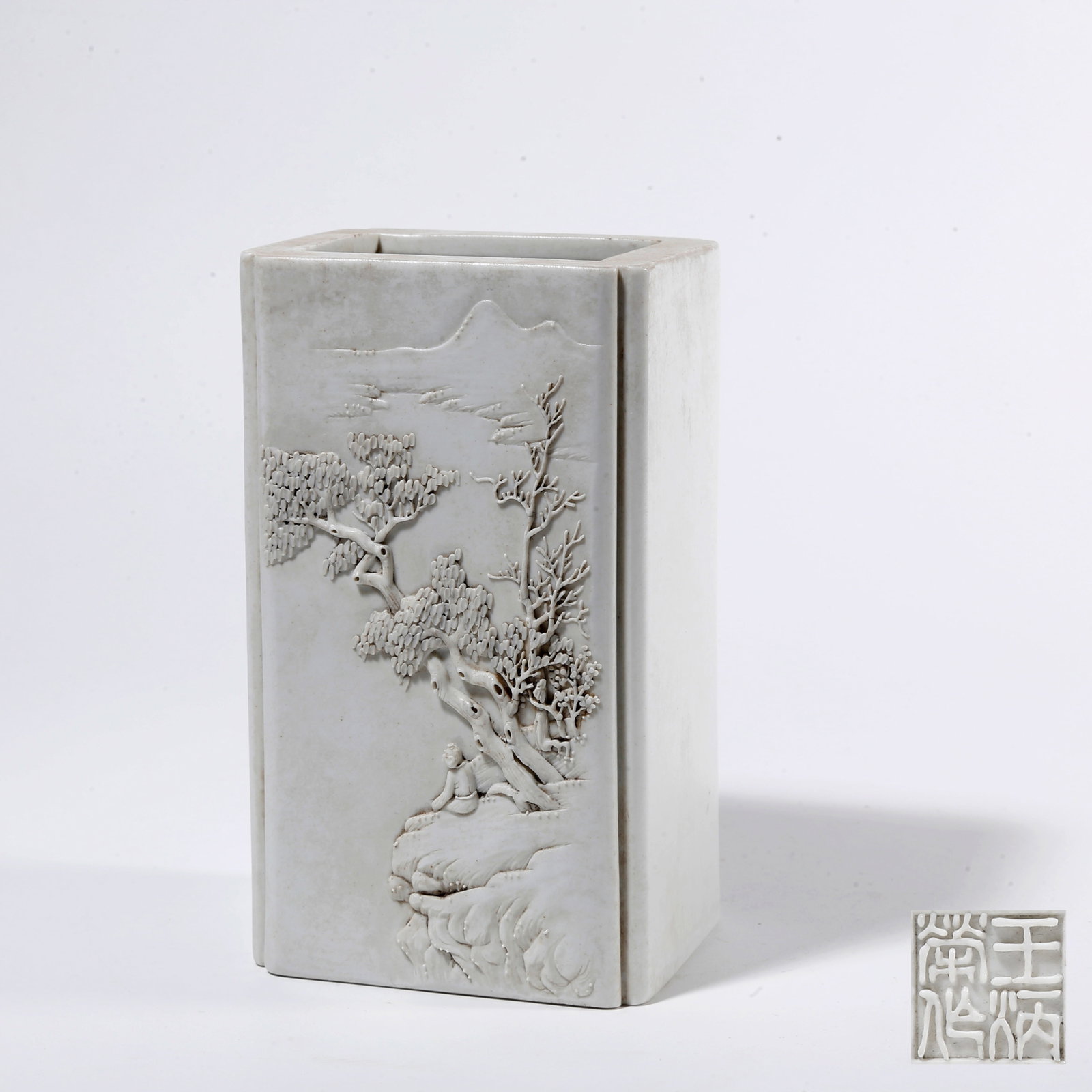 A WHITE GLAZED BRUSH POT WITH LANDSCAPE AND FIGURE PATTERN (1 of 10)