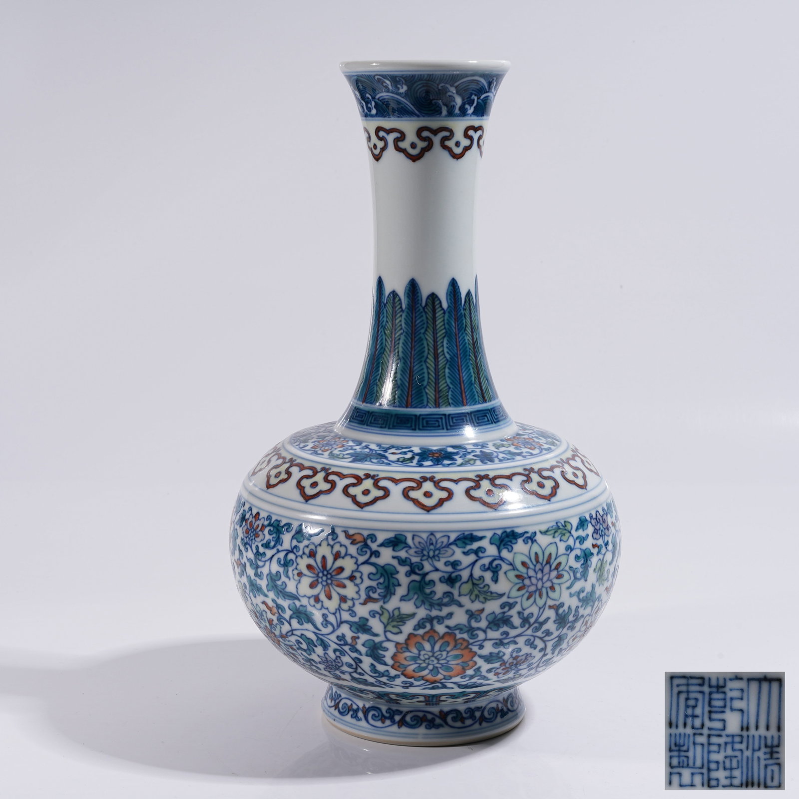 A DOUCAI LONG-NECKED VASE WITH INTERLOCKING FLORAL PATTERN (1 of 9)