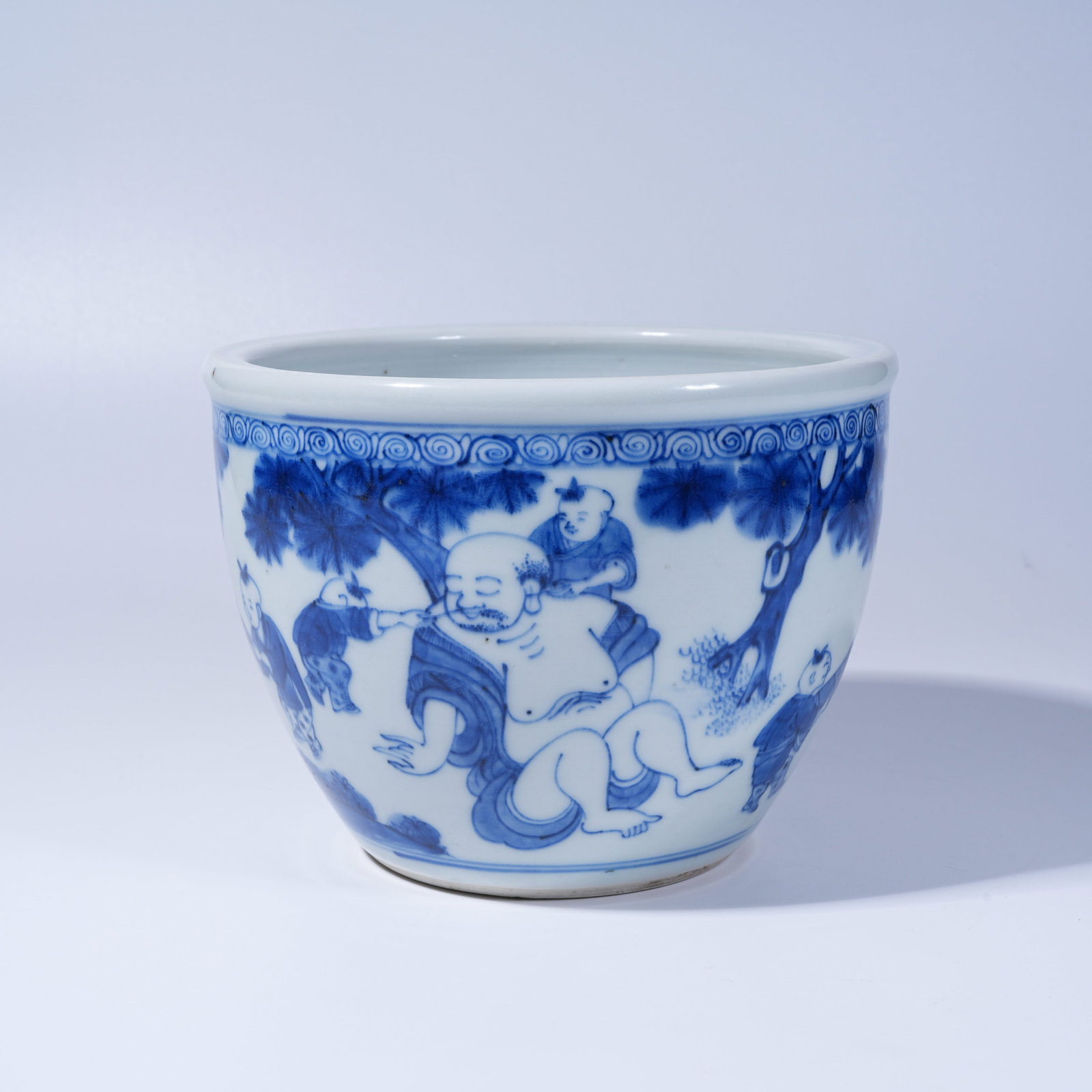 A BLUE AND WHITE JAR WITH CHILDREN AT PLAY PATTERN (1 of 9)