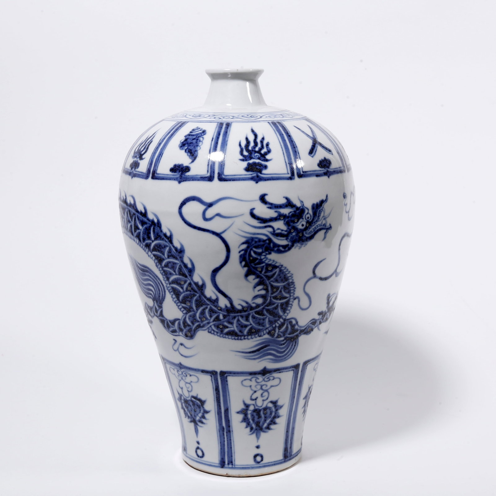 A BLUE AND WHITE PLUM VASE WITH CLOUD AND DRAGON PATTERN (1 of 9)