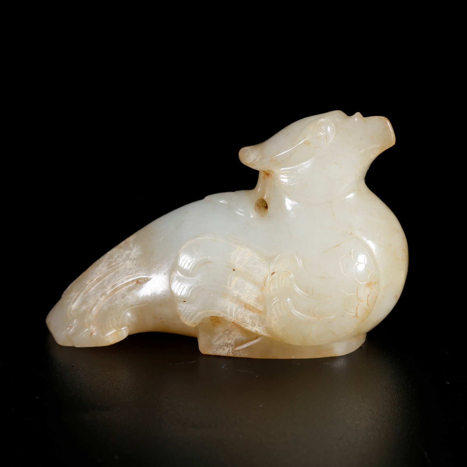 A HETIAN JADE CARVING OF A PHOENIX-SHAPED ORNAMENT (1 of 9)