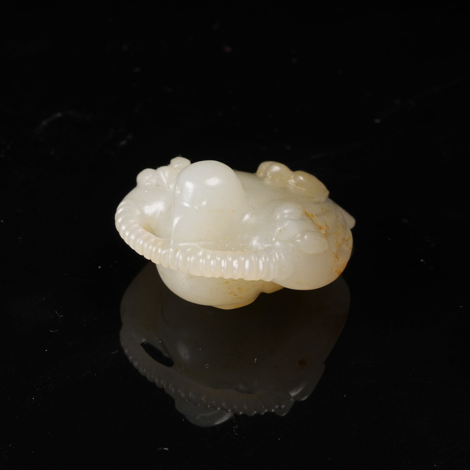 A HETIAN JADE MYTHICAL BIRD PENDANT (1 of 8)