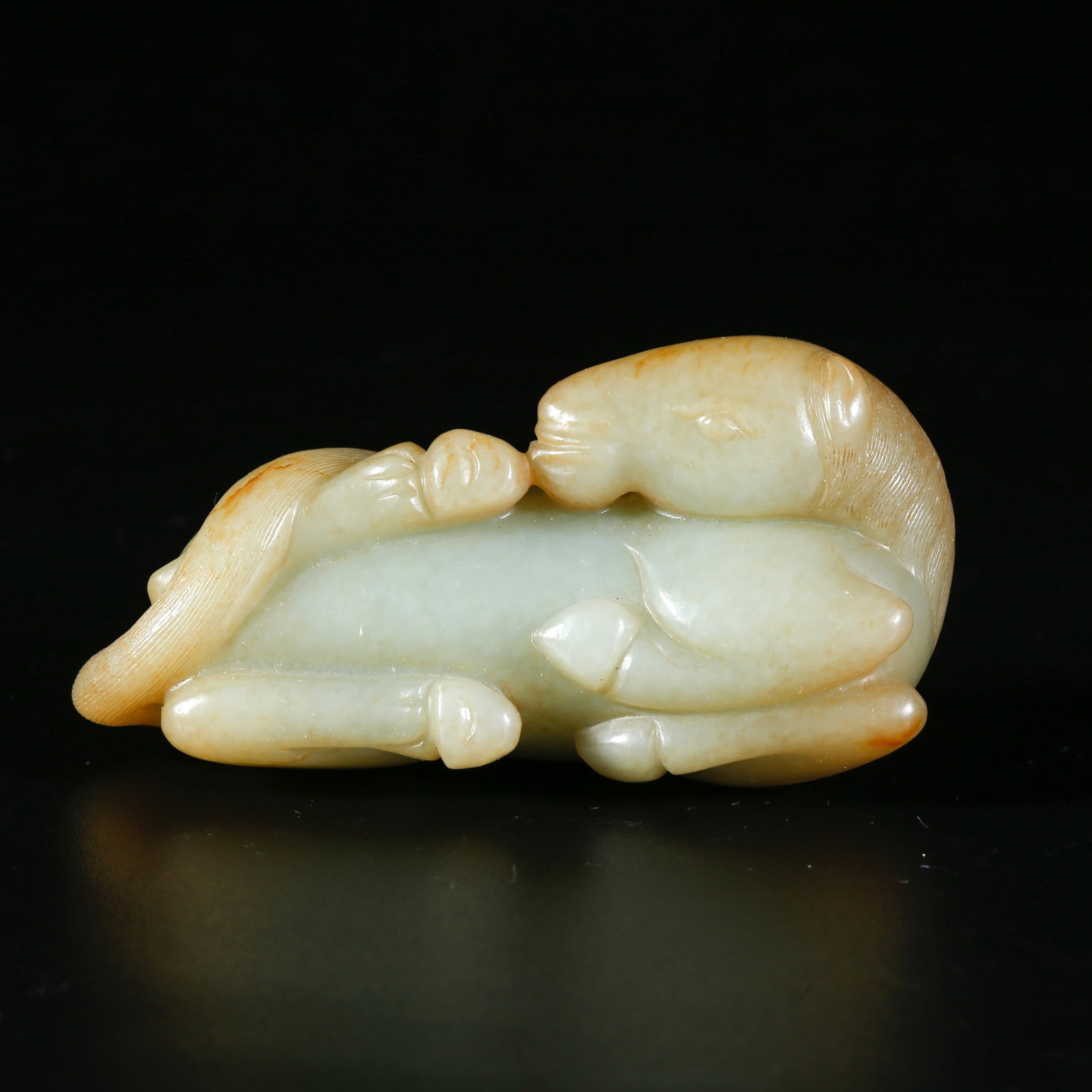A HETIAN JADE CARVING OF GALLOPING HORSE FIGURINE: Hetian Jade Carving of Galloping Horse Figurine