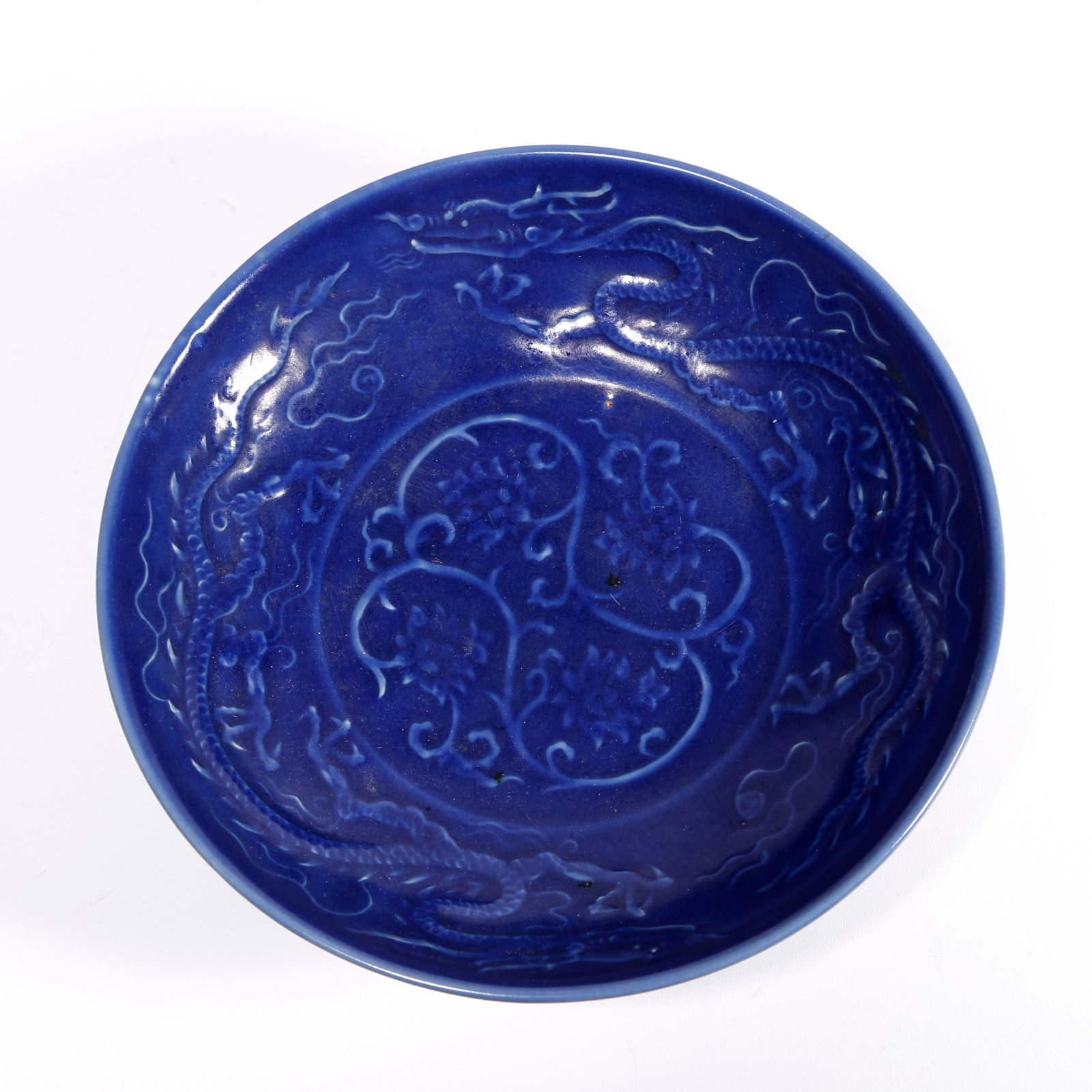 A BLUE GLAZED PLATE WITH DOUBLE DRAGON PATTERN (1 of 9)