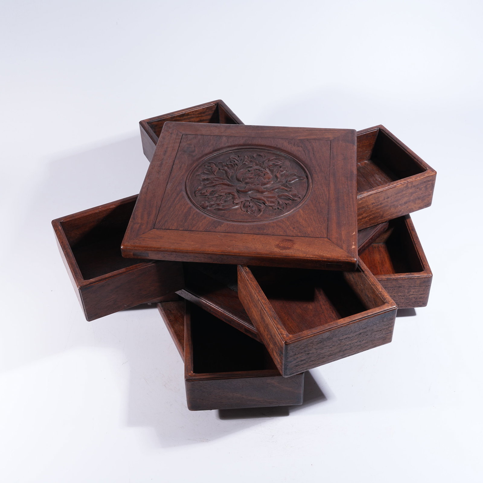 A MULTI-COMPARTMENT TREASURE BOX WITH FLORAL MOTIF IN HUANGHUALI WOOD (1 of 10)