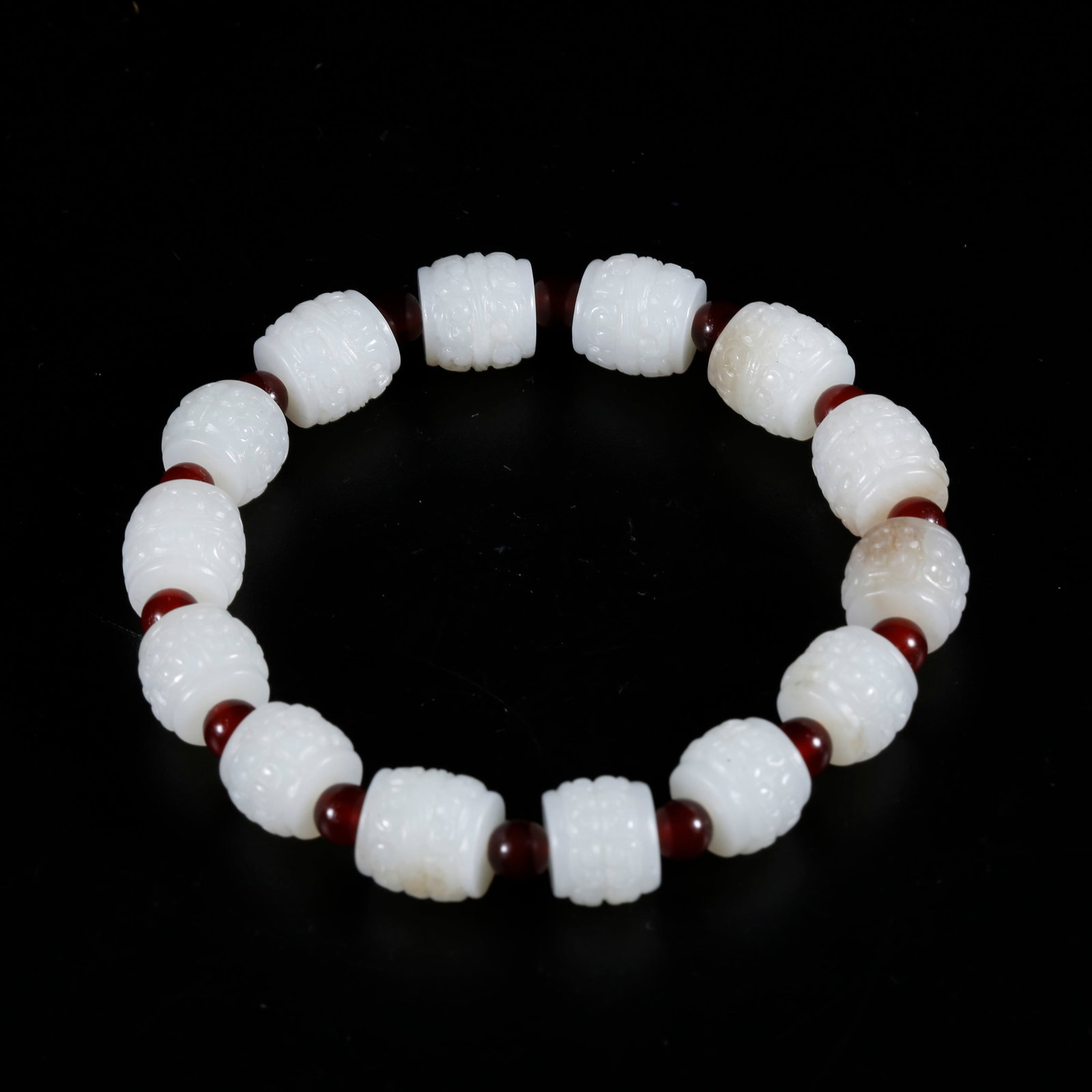 A HOTAN JADE CARVED BRACELET (1 of 9)
