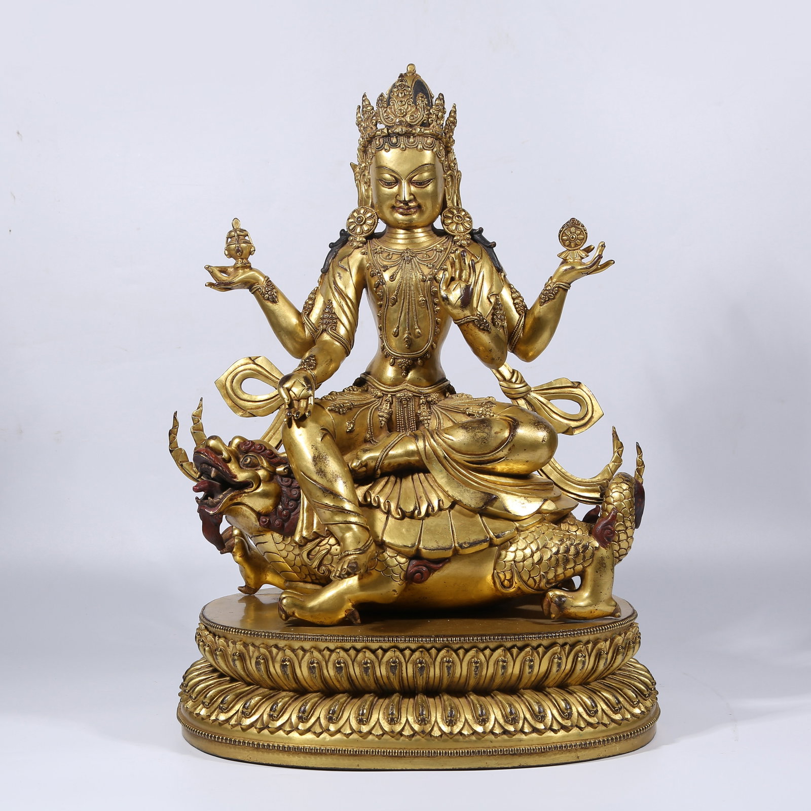 A GILT BRONZE TARA STATUE (1 of 9)