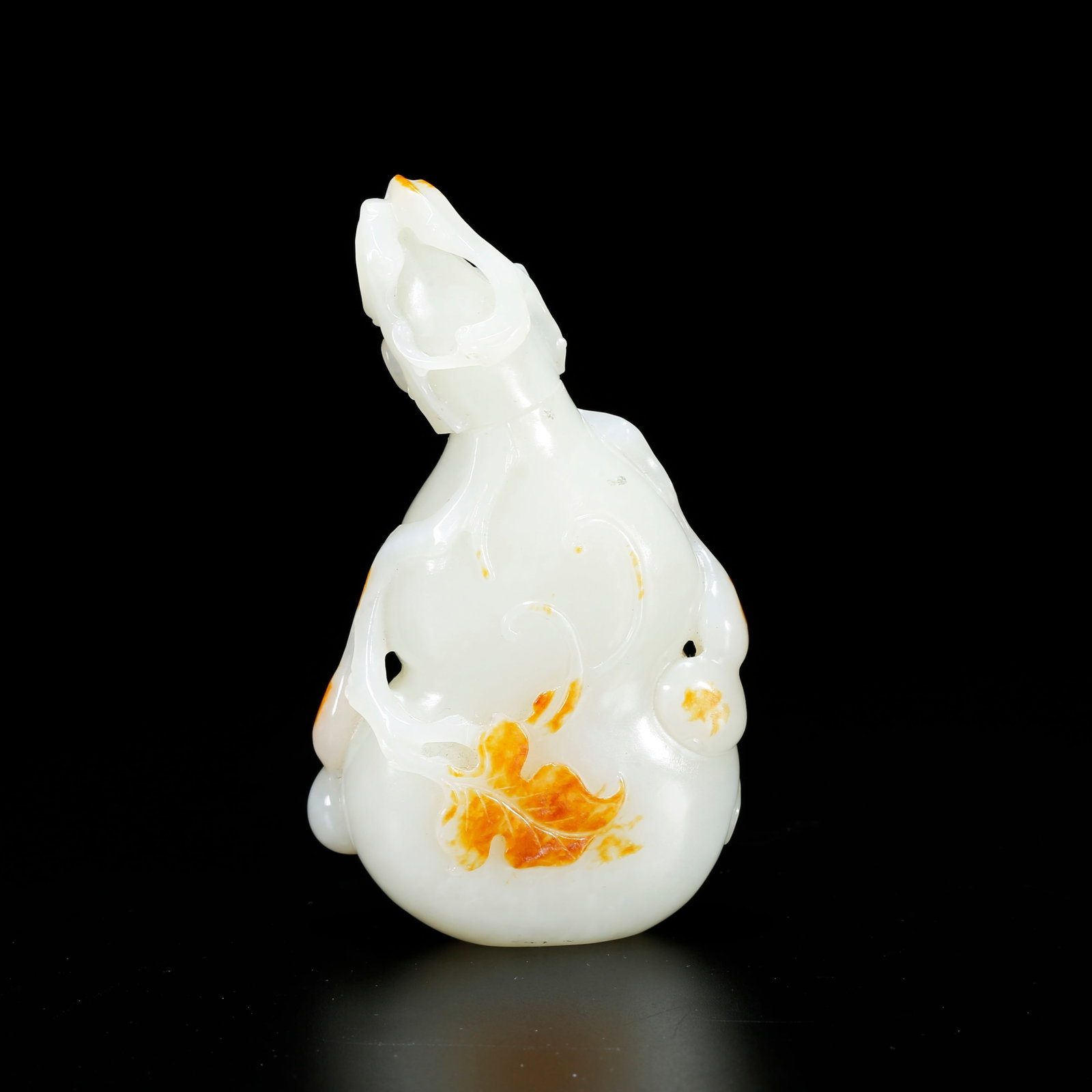 A HETIAN JADE GOURD-SHAPED SNUFF BOTTLE (1 of 9)