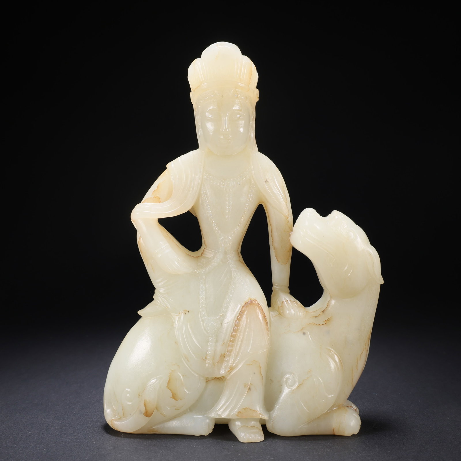 A HETIAN JADE GUANYIN RIDING A LION (1 of 9)