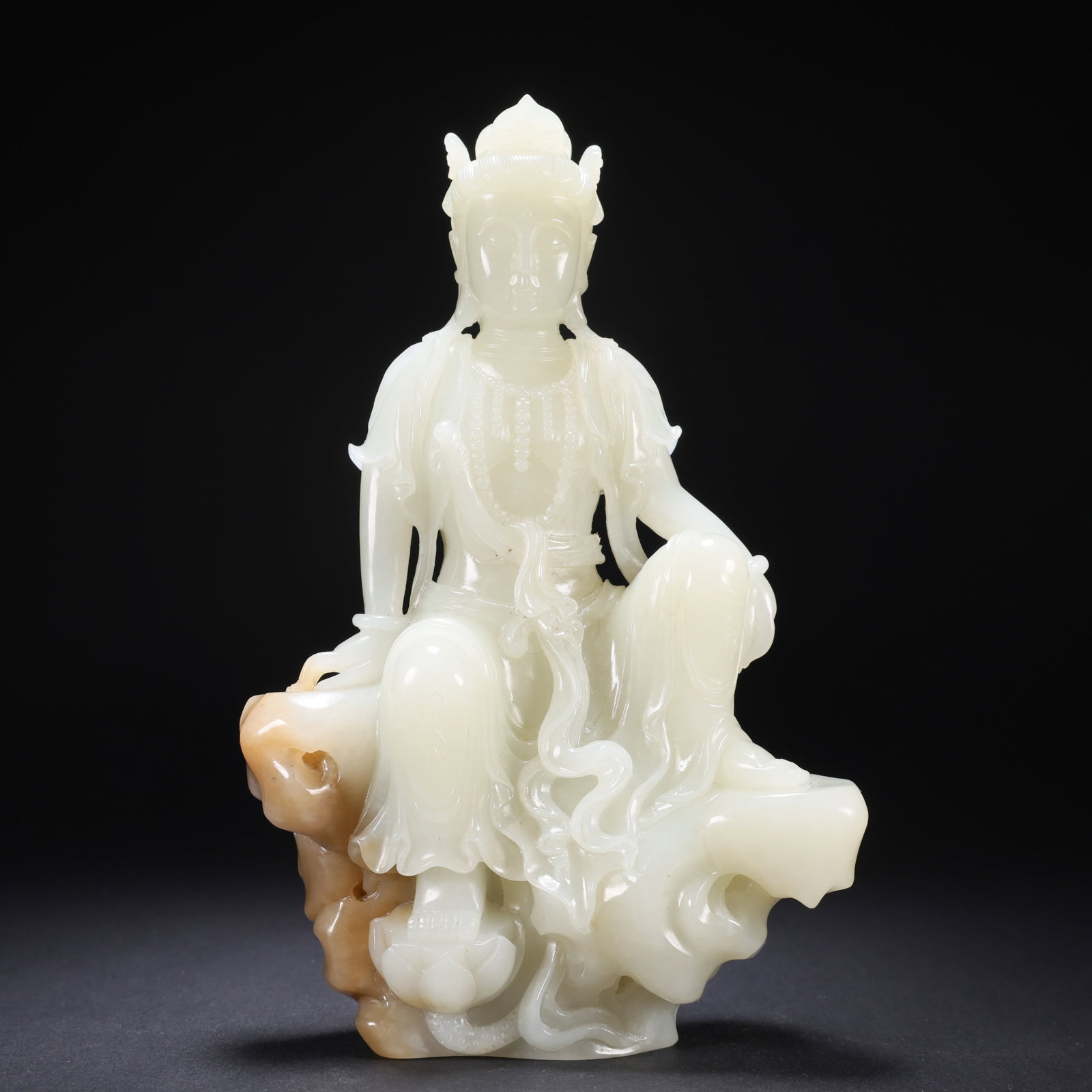 A HETIAN JADE SEATED BUDDHA (1 of 9)