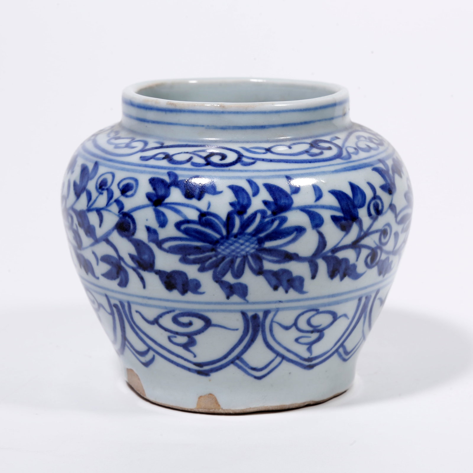 A BLUE AND WHITE JAR WITH INTERLOCKING FLORAL PATTERN (1 of 9)