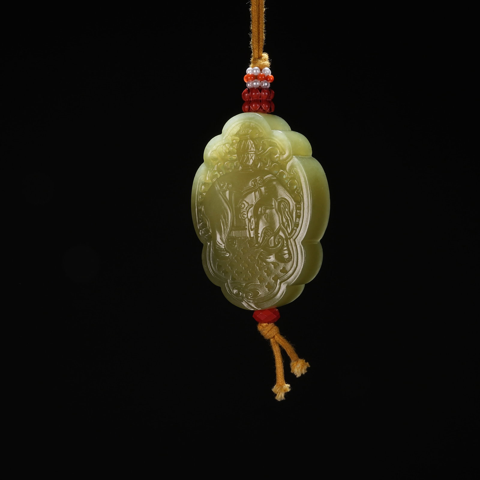 A HETIAN YELLOW JADE FRAGRANT SACHET WITH "ELEPHANT BEARING PEACE" MOTIF (1 of 8)