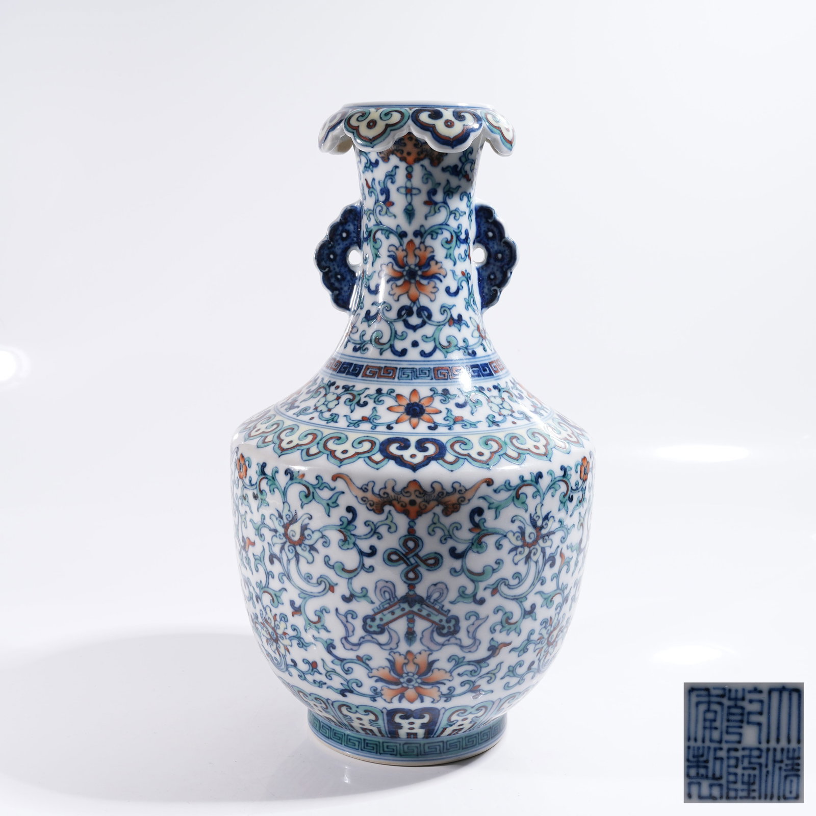 A DOUCAI PLATE-MOUTHED ZUN VESSEL WITH FLORAL EARS AND INTERLOCKING PRECIOUS FLORAL PATTERN (1 of 10)